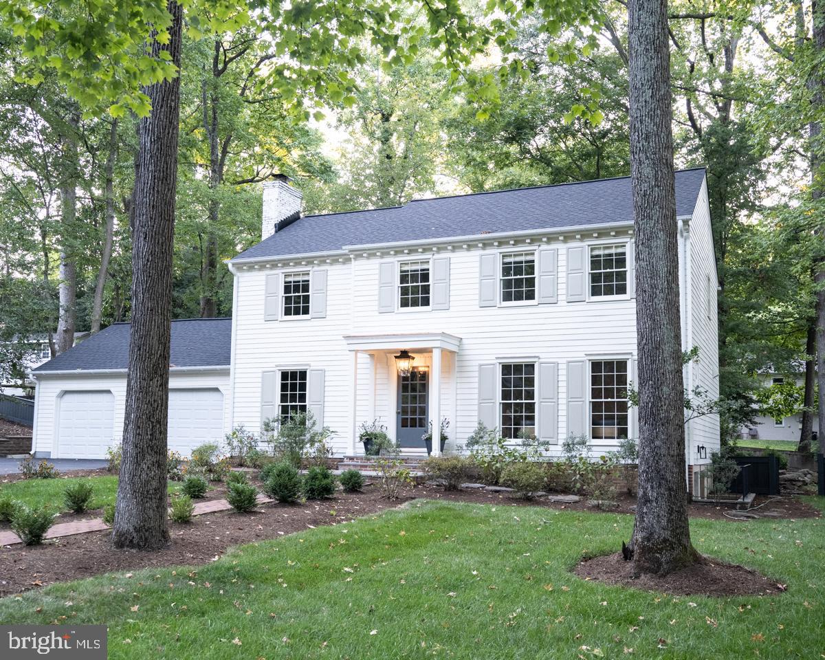 New England-style grace, meets SoHo Cool in the heart of water-privileged Anchorage. Tall windows invite light into this classic colonial that is as charming and stylish as it is elegant. The exterior was significantly updated in August 2024 with a new architectural shingle roof, new hardie siding, new Portico and lighting, new paint, new white-wash on brick chimney, and new sod. The interior was recently renovated with high end fixtures, hardwoods, blue-stone, marble tiles, marble countertops, solid wood doors, solid brass door fixtures and exacting fit & finish. The fenced rear yard offers a generously sized blue-stone patio with room to play in the front and rear yards. The new portico and light fixture lead you to the foyer, where you can enjoy a light-filled great room connected to the updated marble kitchen and butler pantry with high end appliances. A second family room offers a more intimate setting with a wood-burning fireplace and exposed wood beams. The dining area offers views of the private, fenced yard. The mud-room entry and powder room are must-haves for families on the go. With four bedrooms on the upper level, there are options for bedrooms and a home office. The bedroom level has a dedicated stacked laundry room and a second laundry room with a back-up refrigerator on the lower level. The large attached garage provides space for storage and work tables while still parking both cars. The lower level offers storage, plus a third, large family room for recreation or entertainment. Built-in cabinetry and TV makes it easy to enjoy movie night on Day 1. Fifth bedroom and full bath with basement walk-out make this level a versatile addition to your home. Suitable for guests and a possible home office or au pair suite.
The neighborhood of Anchorage is a hidden gem in Annapolis with only 106 homes. Very few communities enjoy this type of quiet living with wide streets, large yards and mature trees throughout. Anchorage offers 49 deep-water slips at no additional charge to your HOA dues, a volunteer-run marina and boat ramp on Lake Ogleton, a community swimming pool, kayak and paddle board storage and a half basketball court.