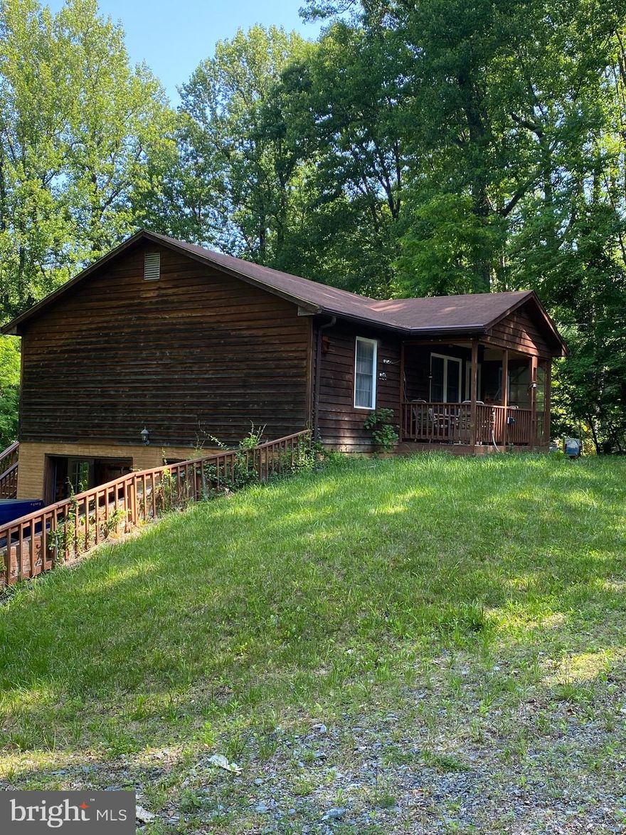 Property is move in ready. Located on 1 acre. Home is wired for a whole house Generac generator (except HVAC) propane fueled.  New HVAC, Water Softener, well pump, pressure tank and gas stove. Septic pumped and has gutter helmet. Home is private and close to the Route 50 side of Shenandoah Farms community.  The community offers two lakes for fishing and swimming and also access to the Shenandoah River.
Property being reduced over $20,000 seller is asking buyer to pay all closing cost