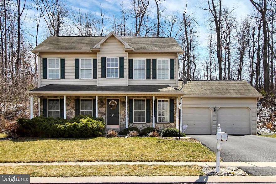 SELLERS ARE MOTIVATED - NEW PRICE! Lovely custom built home in The Woods, located on a quiet cul-de-sac with a breath taking view of the mountains. Meticulously maintained with a great floor plan featuring: 3 large bedrooms, a master suite, an eat-in kitchen, a formal dining room & upgrades throughout. Lower level features an office/rec room. The well groomed grounds include an oversized deck & a secluded wooded lot. All appliances are included in sale. This is a must see home!