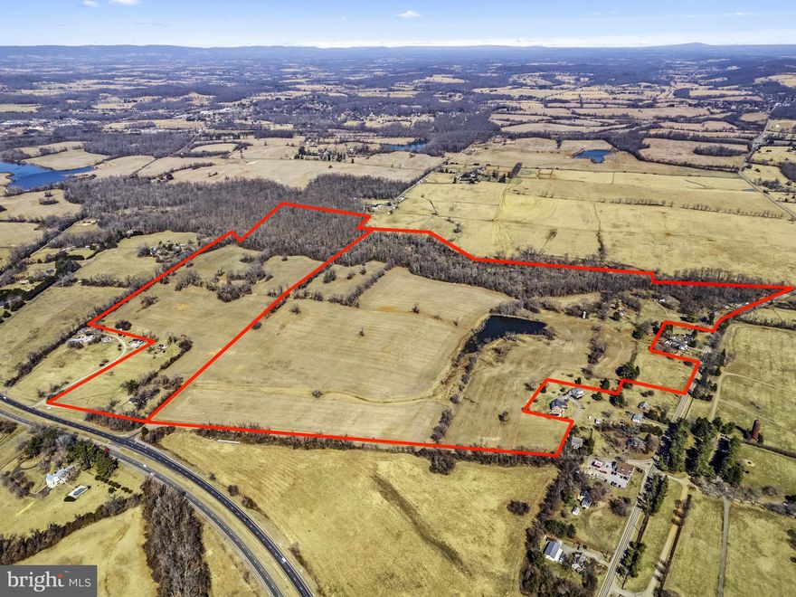 Edwardsville, 2 recorded parcels totaling 190 acres with frontage on Old Tavern Road and Old Winchester Road across from Great Meadow, in The Plains. Farm has been in the same family since the 1940’s.  34.89 acres are zoned R1 potential of 31 lots, balance RA acres can be total of 10 lots.  Excellent conservation easement potential.  There are 10 total residences currently and 9 of the 10 are leased month to month, total income of about $110,000/year.  Property being sold in “AS IS” condition. Seller not liable for any roll back taxed.  AG lease allows farmers to cultivate the crop.  Land is gently rolling and mostly open, frontage on Piney Branch, large spring fed pond, mountain views in all directions.  Older home on the property believed to be school at one point.  Talk to listing agent regarding DEQ issue from Neighbor’s property.