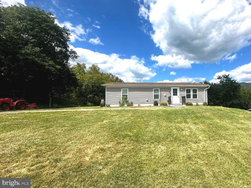 Discover the ideal retreat on nearly 2 acres of pictures land with breathtaking views! This newly renovated home features a modern kitchen and bathroom, complete with stylish finishes. Enjoy the warmth of new laminate flooring throughout, adding both elegance and durability. Step outside to relax on your brand-new deck, perfect for soaking in the stunning scenery.

This property also includes a convenient propane tank, making it a great deal for those seeking comfort and efficiency. Whether you’re looking for a weekend getaway or a permanent residence, this home is a must- see!