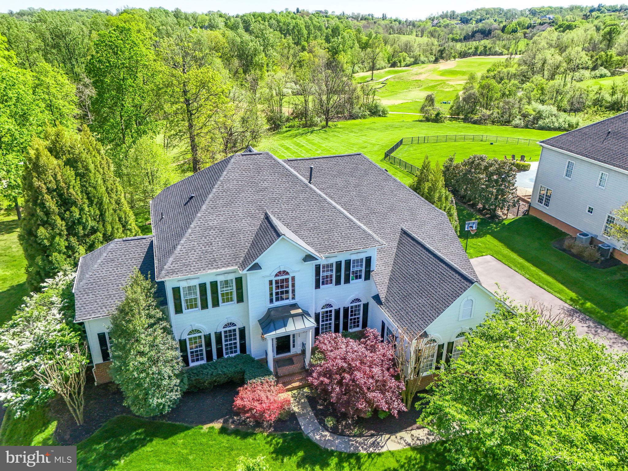 $100,000 PRICE DROP! Welcome you to your Loudoun County north-facing dream home! This magnificent M/I Homes built Pebble Beach Model boasts over 6,800 sq ft of finished living space spread across three exquisite levels. Nestled on a prime .64-acre lot, this luxurious residence backs directly onto Beacon Hill Country Club golf course, offering breathtaking views and serene living under a new roof installed in 2023.
Step inside to find an elegantly designed interior featuring a traditional design layout that maximizes both comfort and style. The home was thoughtfully designed, and has a fresh exterior paint job and new roof completed in 2023 , ensuring years of worry-free living. The driveway was refinished in 2022, providing a polished entrance to this stunning property. Not to mention the expansive Invisible Fence to contain your canine companions!
The heart of the home is a chef's delight, equipped with a brand-new Kitchen-Aid refrigerator, dishwasher, and microwave, perfect for entertaining family and friends. The property also includes GE water treatment system with a whole-home filter installed in 2021, ensuring pure, clean water throughout the home.
The lush outdoor environment is equally captivating. Enjoy a flagstone walkway leading to a charming brick front stoop with a portico, complemented by professional landscaping featuring extensive planting and tree beds. Relax and unwind on the rear raised slate patio, perfect for hosting gatherings or simply enjoying the tranquil surroundings.
This exceptional home features four spacious bedrooms and four luxurious bathrooms, providing comfort and privacy for everyone. With its combination of modern amenities, elegant design, and picturesque views, this home is not just a residence; it's a lifestyle.
Don't miss the opportunity to make this remarkable property your own! Schedule a showing today and experience luxury living at its finest.