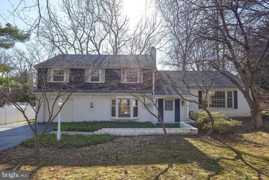 Situated in the highly sought-after School Lane Hills neighborhood, this 4-bedroom, 2.5-bath home offers a wonderful opportunity for buyers looking to personalize a classic residence. With a traditional layout and generous living spaces,  this home is ready for modern updates to enhance its charm and functionality.
Upon entering, you're welcomed into a spacious living room, perfect for entertaining or everyday relaxation. The home features a formal dining room, ideal for hosting special occasions, holiday gatherings, or dinner parties. Just off the dining area, the eat-in kitchen provides ample space for casual meals, morning coffee, or family breakfasts, with plenty of potential  to suit modern tastes.
Step into the large family room, where a cozy fireplace serves as the focal point, creating a warm and welcoming ambiance. The adjoining fully finished sunroom bathes the space in natural light and offers a serene view of the level backyard—a perfect outdoor retreat for entertaining, gardening, or playtime. 
Upstairs, you'll find four generously sized bedrooms, offering flexibility for a growing family, home office, or guest accommodations. With a few updates, these spaces can be refreshed to provide personalized comforts while maintaining the home’s timeless appeal.
Located in a well-established, tree-lined neighborhood, this home is just minutes from parks, shopping, dining, and major roadways, offering both tranquility and convenience. For the right buyer with vision and creativity, this property presents an excellent opportunity to transform it into a truly special home in School Lane Hills.
Don't miss your chance to own a home in this prime location—schedule your showing today!