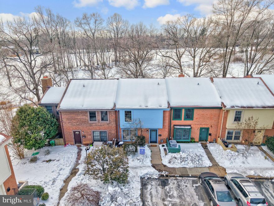 DEADLINE FOR ALL OFFERS IS SUNDAY, FEB. 8 AT NOON. Welcome to 2120 Golf Course Drive in sought-after South Reston! Get ready to enjoy incredible views of Reston National Golf Course & mature trees throughout the year! This home has been meticulously maintained & updated by the original owners, including recent updates & upgrades throughout. With 3 bedrooms, 3 1/2 bathrooms on 3 finished levels with a fully finished walk-out lower level, this turnkey home is move-in ready! Enjoy the ease & convenience of the 2 assigned parking spaces, both are located just steps from the home (#95 and #98). The level, front walkway is convenient for bringing in groceries, etc. 
MAIN LEVEL: The main level features an open & airy floor plan with golf course views (also the name of the cluster!) from the moment you step into the foyer. There are hardwood floors throughout the main level & recessed lighting is featured in the kitchen & main living area. The main level deck is accessible from both the dining & living rooms through glass French doors. This is the perfect spot to enjoy the views! The kitchen features a large breakfast area & nice amenities. With quartz counters, spacious 42" cabinets with "pull-out" drawers below, soft-close cabinetry, stainless steel appliances, recessed lighting, undercabinet lighting, gas cooking with convention/convection cooking options, & more...this kitchen truly is the heart of the home. The owners also opened up the wall between the kitchen & the living room to add a quartz counter with a raised ledge with cabinet space above. Other features on the main level include the powder room (updated in 2022, including marble counters!) & a hall coat closet. UPPER LEVEL: The upper-level features 3, spacious bedrooms - all with hardwood floors - & 2 full bathrooms plus a hall linen closet. The primary suite is an incredible space, with 2 separate closets & an upgraded ensuite bath. The primary bath was remodeled in 2022 with impressive attention to detail with an undermount sink, marble counters, soft-close cabinets, a ceramic tiled shower with glass shower doors & an updated ceramic tile floor. The 2 additional bedrooms on the upper level both have amazing views of the golf course. The full hall bathroom was also renovated in 2022 & has an undermount sink, marble counters, soft-close cabinets, an upgraded ceramic tiled shower/tub & updated ceramic tile floors. FULLY FINISHED, WALK-OUT LOWER LEVEL: This level has been completely refreshed with new luxury vinyl plank flooring, recessed lighting & new paint. The recreation room has two large windows offering ample natural light, and there is a glass French door leading to the lower-level back deck and lawn (with incredible views of the golf course and trees). This space is perfect for entertaining with friends & family & great work-from home space as well. There is also an updated full hall bathroom on this level. The separate laundry room with a newer full-size LG washer and dryer (2022) is on this level, too, as well as an unfinished storage room with a workshop table & shelving. In addition, there is a large storage shed outside next to the back deck. UPGRADES AND UPDATES: Most of the interior freshly painted (2026). New recessed lighting in the living room & recreation room (2026). New luxury vinyl plank flooring on the lower level (2026). New wood siding at the front of the home (2024). Refrigerator, built-in microwave, & full-sized washer & dryer (2022). Upgraded primary bathroom, full hall bathroom & main level powder room (2022). New main level deck flooring (2021). HVAC (2017). COMMUNITY:  Super-convenient stroll to South Lakes Shopping Center - with Safeway, CVS, & more! Close to major commuter routes. Wiehle Ave. Silver Line Metro Station is just a mile away! Dulles Airport is <6 miles away. Reston Assn offers miles of paths & trails, 15 pools, tennis courts, the Reston Community Center, Walker Nature Center & more.