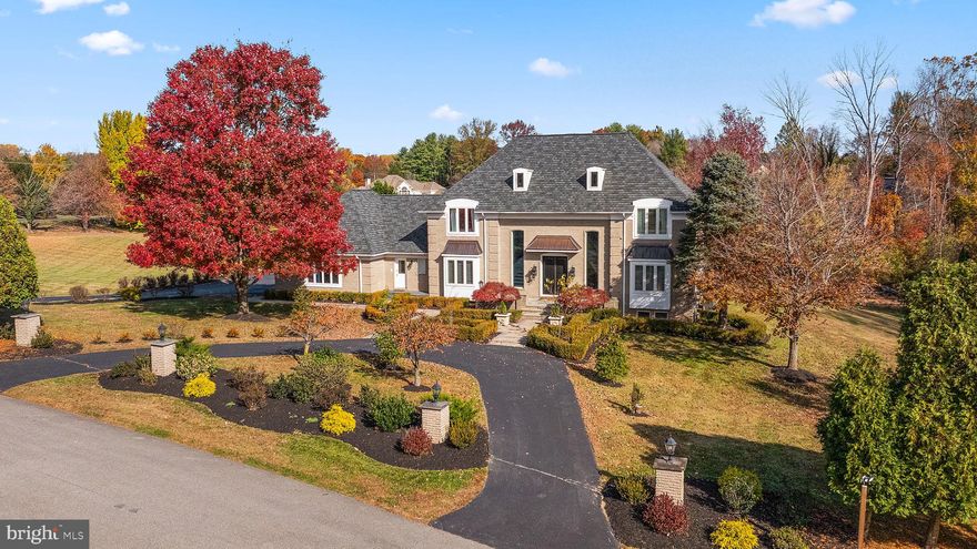 Situated in one of Greenville’s most sought after enclaves, 200 Dogwood Slope Road is a stunning 4 bedroom, 4.5 bath Colonial residence that blends timeless charm with modern refinement. Resting on nearly 3 private acres of landscaped grounds, this meticulously updated home offers a serene retreat just minutes from Greenville’s premier shopping, dining, and scenery.

A welcoming foyer opens to sun filled formal and casual living spaces designed with an effortless flow. The home’s interior has been completely refreshed, showcasing designer finishes, hardwood flooring, and elegant millwork throughout. The centerpiece of the main level is the all new custom kitchen, featuring premium cabinetry, quartz countertops, and a Le Cornue range cooktop - a showpiece for the culinary enthusiast. This space seamlessly connects to the dining and family rooms, creating a warm and open atmosphere ideal for entertaining or family living.

Upstairs, the primary suite has been transformed into a private sanctuary. The fully renovated en-suite bathroom features a spa-inspired design with custom tilework, a luxurious walk-in shower, dual vanities, and elegant fixtures creating the perfect place to unwind. Three additional bedrooms provide generous space, each with ample natural light and access to updated baths.

The finished lower level extends the living space with a full bathroom and two additional finished rooms, ideal for guests, a home office, or in-law suite. With these rooms there is an abundant flexibility for a home gym, game room, or private theater, allowing the next owner to tailor the space to their lifestyle.

Outside, the property’s nearly 3-acre lot offers privacy and endless outdoor possibilities from garden spaces and patios to future pool or entertainment areas. A brand-new roof adds peace of mind and lasting value, complementing the extensive updates that make this home truly move-in ready.

This is Greenville living at its finest-a rare combination of refined craftsmanship, modern amenities, and an unbeatable location.