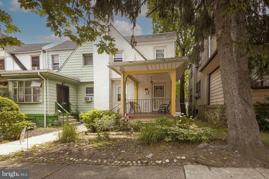 Charming 3 bed/1 bath home with garage parking on a fantastic, tree-lined block in ever popular West Mount Airy!  The covered front porch welcomes you into a spacious living room with gorgeous parquet floors that continue into the separate dining area.  The galley style kitchen opens up to the dining area for easy entertaining.  Sliding doors lead to a deck that's perfect for grilling, relaxing and enjoying morning coffee.  Upstairs you'll find three good sized bedrooms and a full bathroom.  The basement features a washer dryer and direct access to the garage.  This is a lovingly maintained home with tons of character, loads of natural light and ample storage.  Conveniently located within walking distance of coffee shops, Weavers Way, the train station, the Wissahickon trails and so much more.