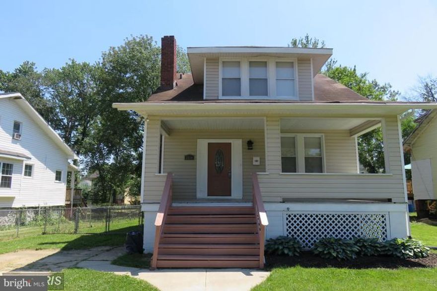 BACK ON MARKET!  Single family home on side street.  Completely redone from top to bottom.  New roof.  Complete with electrical cert and plumbing cert.  FHA appraised.  Ready for settlement.  Turn key condition and ready to move in.  Wont last at this price.  Crown molding, new hardwood floors, stainless steel appliances.  Great yard with a porch overlooking the grounds.