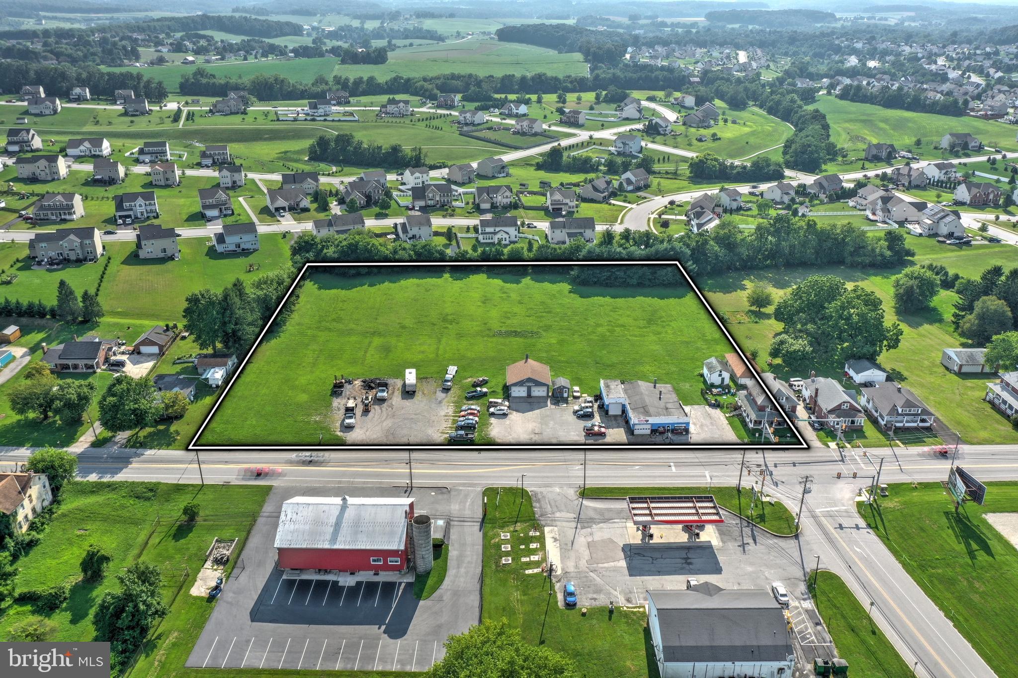 Commercial Land Real Estate 4.293 +/- acres. NO BUSINESS is included in sale of the property. The property sits right on the Baltimore Pike with thousands of traffic count per day.