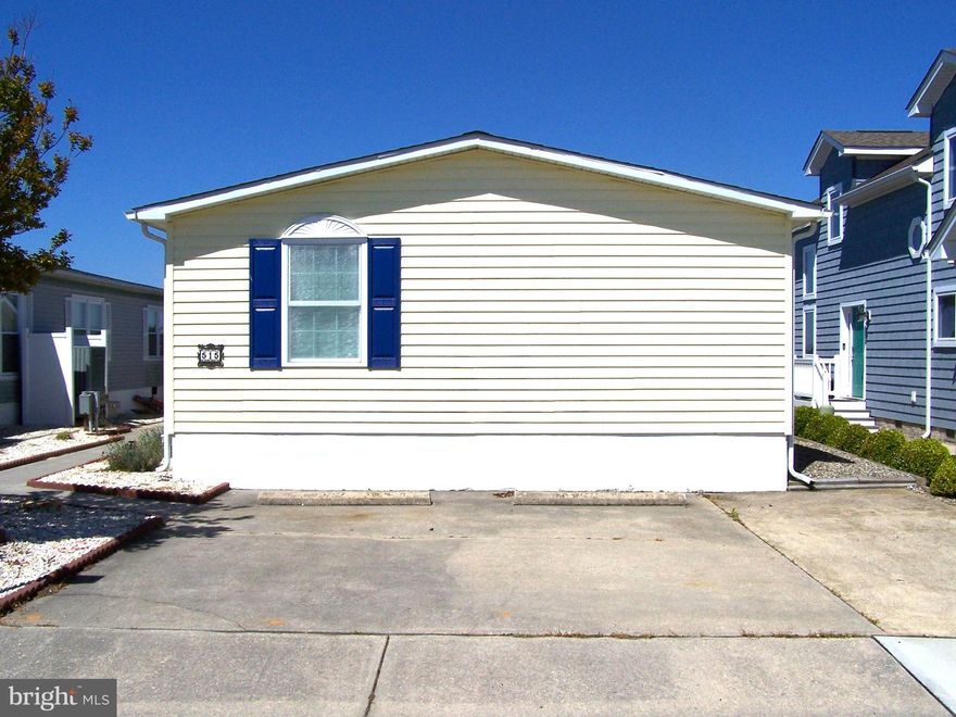 RARE OPPORTUNITY to own a DIRECT BAYFRONT property in the highly sought after community of MONTEGO BAY in North OC!! Built in 1988, this spacious residence offers 1,536 sq. ft. of comfortable living space, featuring three cozy bedrooms and two full bathrooms, perfect for relaxation and privacy. Enjoy the convenience of a furnished interior, ready for you to make it your own. Upgrades include a newer HVAC system (2023) and a newer hot water heater (2023). Step outside on the rear deck to embrace the breathtaking bay views where you will experience stunning sunsets every evening! Featuring a private dock and pier, (replaced in 2019) this home is ready for you to enjoy boating/watersports right from your back door. Community amenities include 2 inground swimming pools, 1 kiddie pool, 2 tennis courts, pickle ball courts, a shuffleboard court, a 9 hole mini-golf course, a wildlife sanctuary/park area with a blacktop walking/jogging path, and a bayfront boardwalk with 3 fishing/crabbing piers...all for a low hoa fee of $415.00 a year.  This home is not just a place to live; it's a lifestyle waiting to be embraced. Don't miss out, call now to schedule your private showing.