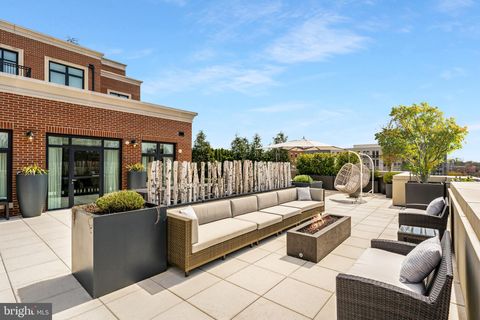 Photo of 4915 HAMPDEN LN #405, BETHESDA, MD 20814 (MLS # MDMC2069206)