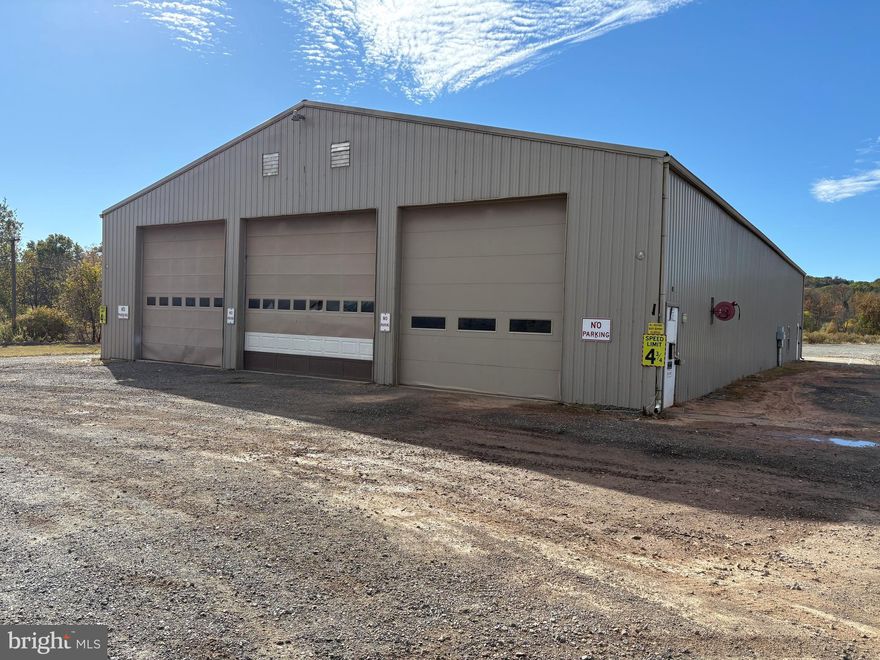 This is a good development opportunity - 22.9 +/- acres zoned Light Industrial in Upper Hanover Township, Montgomery County, Pa with frontage on Route 29.  Public water at the property and public sewer in the immediate area. Gas located back on Tollgate Rd and Lesher Mill Rd. A  Met-Ed Right of Way transgresses the property and consumes 4.5 +/- acres of thge 22.9 +/- acres.  The cell tower on the property  is NOT INCLUDED in the sale.  Copy olf Upper Han ov er Town ship's Light Industrial Ordinanced is under documents, as is a marked up copy of the survey. The metal buildingb is 6,000 +/- SF with approximately 4,200 SF of shop space which is clear span having 14' to 22' ceiling heights, 3 drive in doors (all 14' high - with 2 being 14 ' wide and 1 being 16' wide), 200 amp single phase electric service, slop sink, insulated but not heated. Offices include large reception area, large single office, 2 other private offices, lunchroom and 2 ADA restrooms. Electric baseboard heat and window air conditioners for the office area.