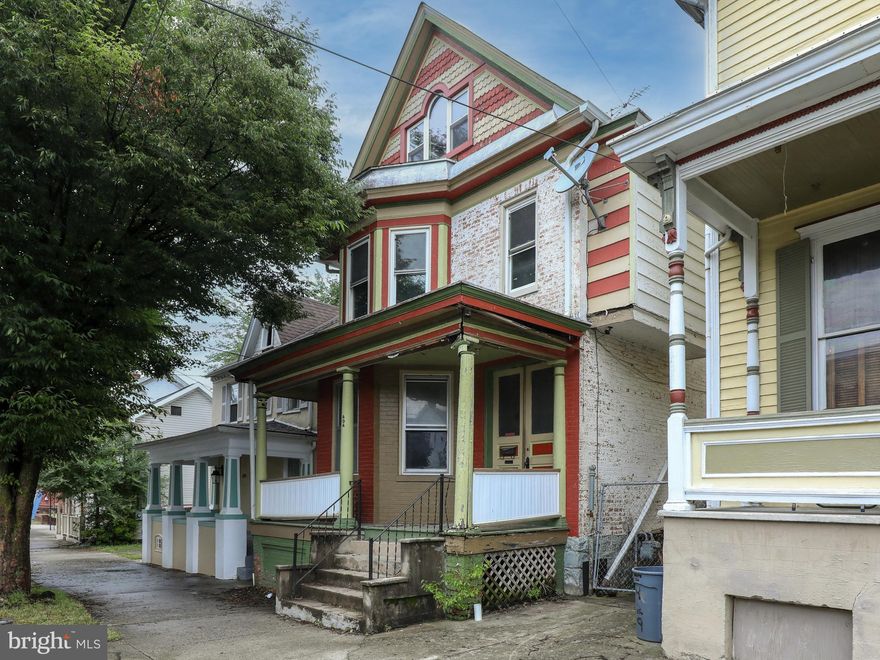 Detached home in Martinsburg, tons of potentintial. Located on large fenced lot, this home will really shine once updated. Original wood charm throughout gives home lots of character.