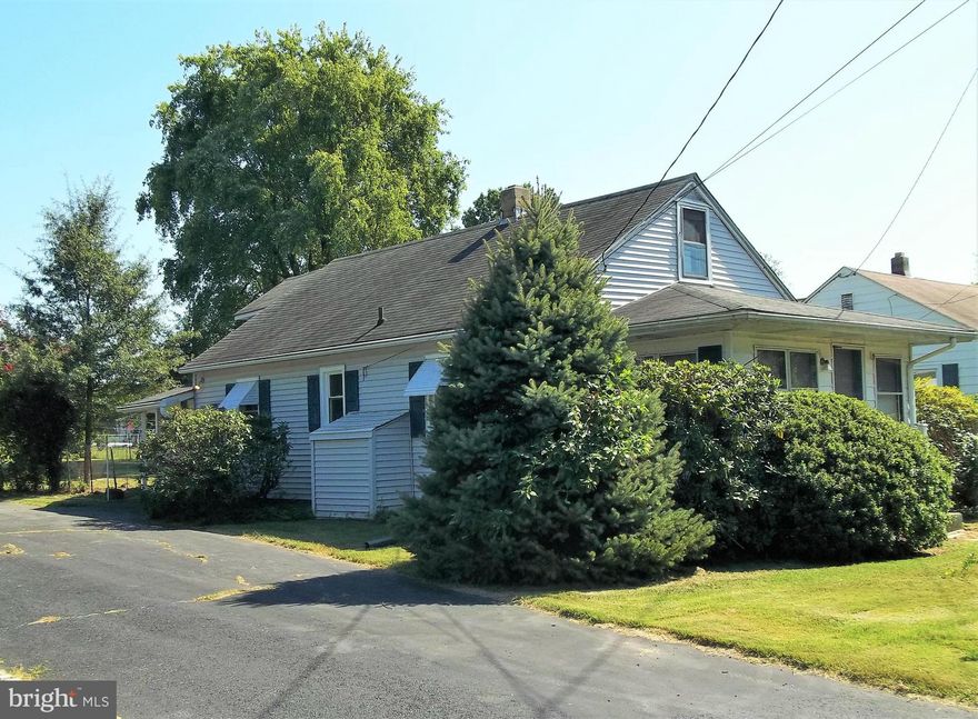 Great Price for this 2 BR, 1 bath house. Selling "as is", no FHA or VA contracts. New Kitchen, most windows replaced, washer & dryer included, attic is floored, partial basement, enclosed front and back porches. HMS Warranty. Large back yard & off street parking. Has CAC & window unit. If you are a handy man or woman, this could be quite charming with a little TLC! Seller wants it sold!