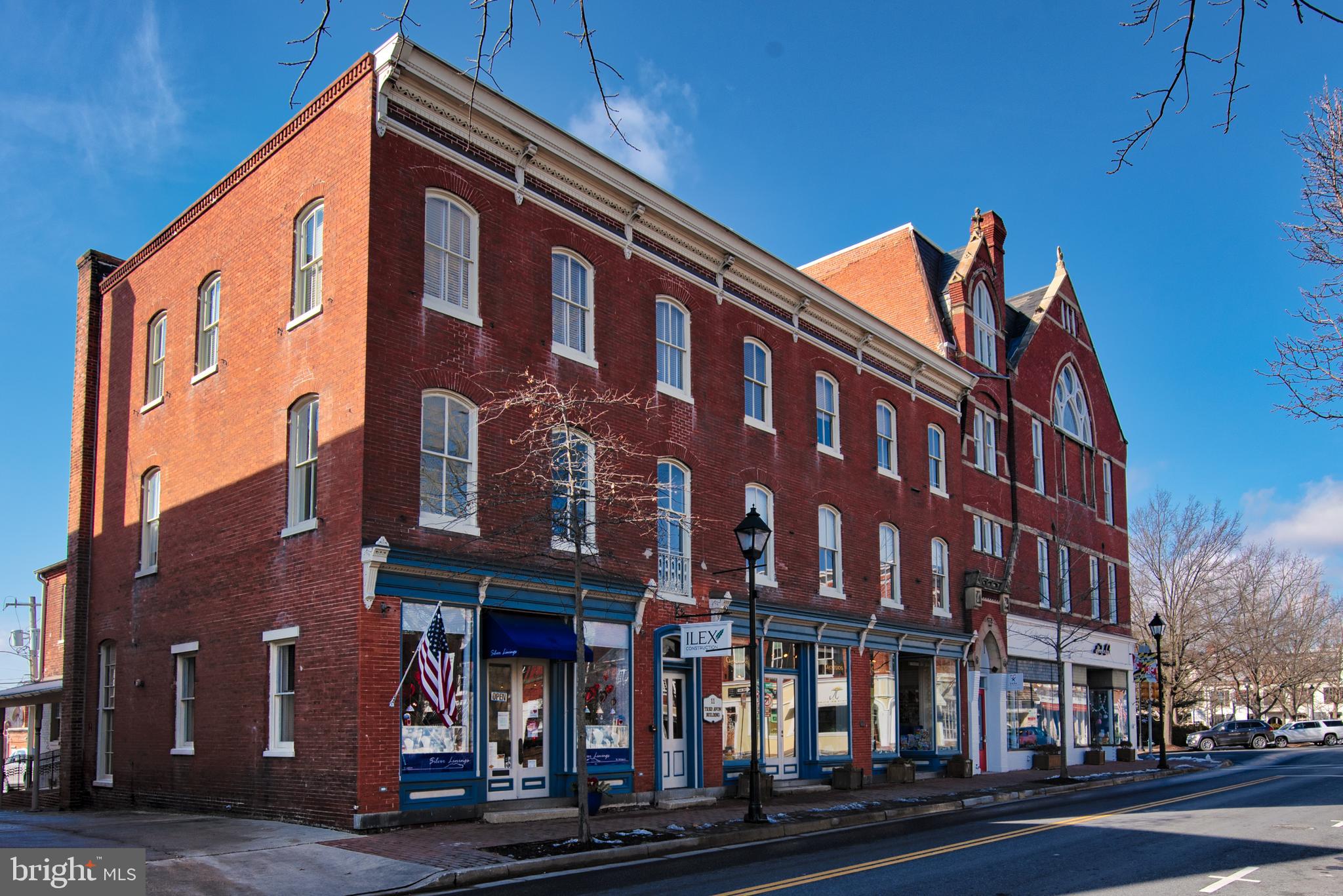 Offered for the first time in forty years the Tred Avon Building is a beautifully maintained, historic building located in the heart of downtown Easton. The building was completely updated in 2001 with all new electrical, plumbing and elevator. The building boasts two first floor retail spaces with terrific storefronts on Washington Street, five additional office suites one the first floor and multiple spaces on the second and third floors. Property also includes a basement and its own, nearly impossible to find, 11 space parking lot with entrance on West Street.