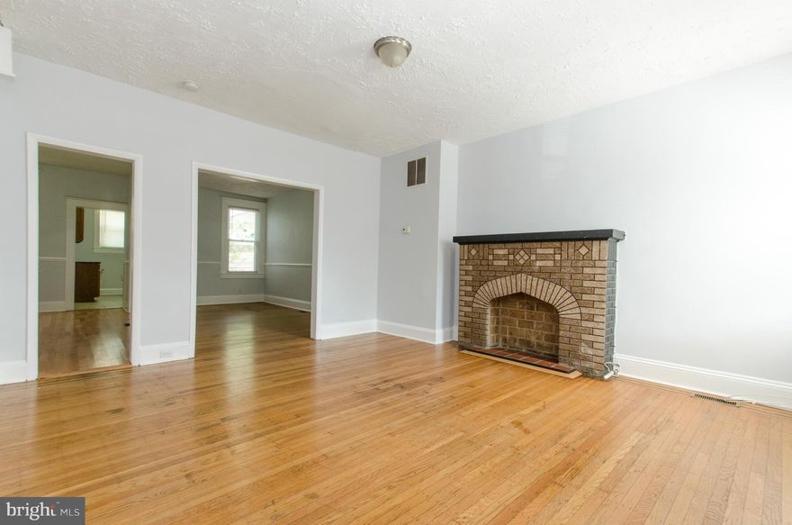 OWNERS: truly move-in ready! INVESTORS: a TRUE turn-key property w/ strong rental history! Offering loads of natural light, new stove & fridge, gleaming hardwood floors throughout, a Morning Rm/Den/Office on the main level, washer/dryer & tons of storage in the LL plus and a stylish interior paint job! Fenced front & rear yards, covered front porch and a 2nd floor balcony. Ready for you NOW!