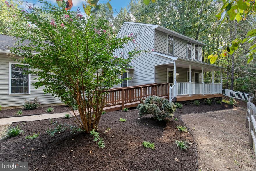 CHARMING COUNTRY 2 STORY HOME WITH BASEMENT. FULL FRONT PORCH, 2 CAR GARAGE, PAVED DRVEWY W/TURN AROUND. PICTURESQUE PRIVATE,PARK-LIKE 1+ ACRE. SPACIOUS FAM RM, FORMAL LRM & DRM,"PERGO" FLRS, CERAMIC TILE.12X16 DECK. GAS FIREPLACE, UPGRADED MOLDINGS. NEW CARPET IN WALKOUT BSMT. A TRUE GEM. MUST SEE THIS DELIGHTFUL HOME.