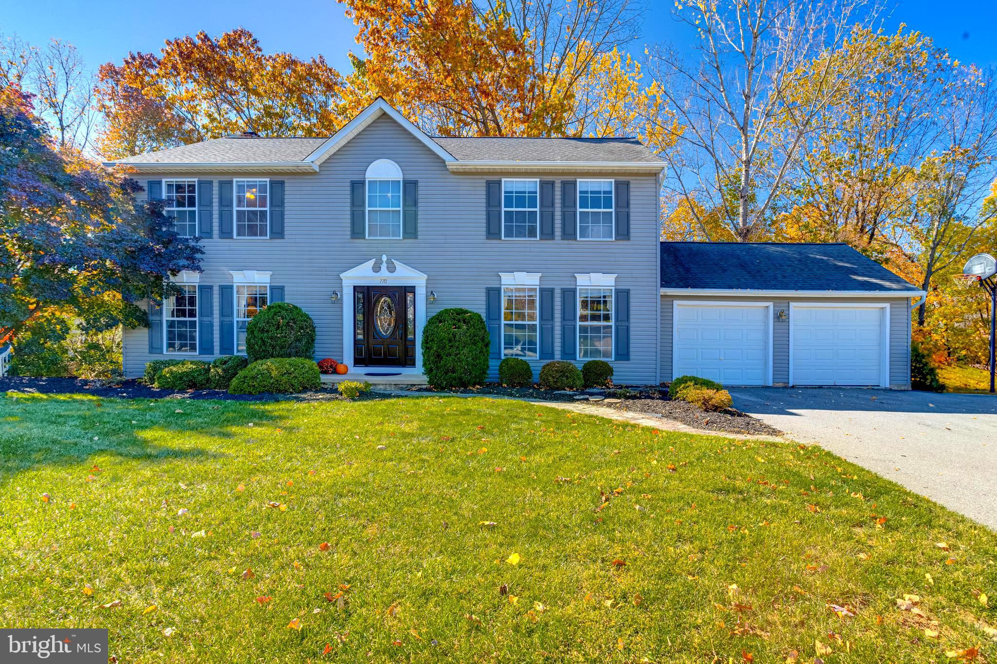Welcome to this stunning 6-bedroom, 3.5-bath colonial home in the highly sought-after Poole Meadows community, featuring a spacious in-law suite! The main level welcomes you with rich hardwood floors throughout, creating a warm and inviting atmosphere. Enjoy versatile spaces with a family room/study, formal dining room, and an expansive kitchen that opens to a large living area with a wood-burning fireplace – perfect for hosting gatherings.
The kitchen is a chef's dream, boasting stainless steel appliances, a large island, and ample cabinetry. Adjacent to the kitchen, you'll find a convenient laundry and pantry area with direct access to the attached 2-car garage.
Upstairs, retreat to a massive primary suite featuring vaulted ceilings, an upgraded ensuite bath with a custom tiled walk-in shower, stylish glass doors, a modern vanity, and both a walk-in and reach-in closet. Down the hall, four additional generously sized and freshly painted bedrooms share a hall bathroom with updated tile flooring.
The fully finished lower level offers an impressive in-law or apartment suite, complete with a full kitchen, living area, legal sixth bedroom with a walk-in closet, and attached spacious bath with a shower. A large storage room with laundry area and two additional storage areas add even more functionality. This level is ideal for multi-generational living or as an income-producing space.
Outside, enjoy the serene privacy of a large deck overlooking a wooded backdrop, perfect for outdoor relaxation. Living in Poole Meadows means easy access to commuter routes, schools, shopping, and dining while still enjoying the peaceful seclusion of this lovely neighborhood.
Schedule your showing today and make this exceptional home yours!