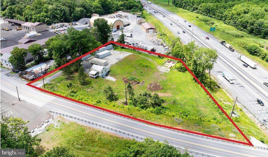 1.67 acres with public water, sewer.  Easy access to major highway routes and  fronts on Interstate 81 and Rock Cliff Dr., Signage visible to Interstate 81.    Land available for heavy equipment storage, vehicle storage, etc.  This lease excludes the house and the storage units, although the Owner is negotiable and open to renting as well.