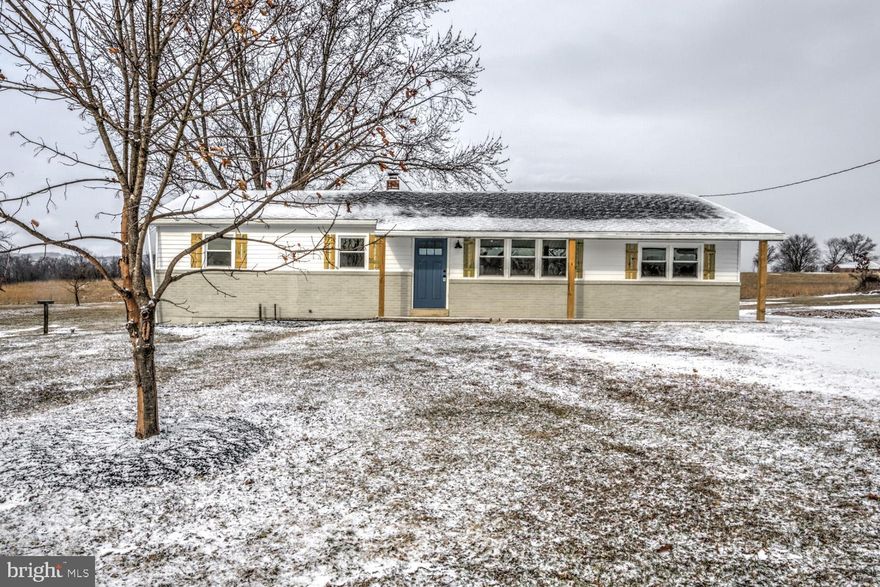 Welcome home to this charming, desirable ranch-style remodel nestled on an acre lot in a peaceful area outside of Carlisle! With 4 bedrooms, 2 full bathrooms, a detached two-car garage, and all new paint, flooring, and fixtures throughout - this house ready to be called your home! Entering the home, you will love the open concept living with the bright family room opening directly to the brand new kitchen. You will note the combination of glowing refinished hardwoods and attracture luxury vinyl tile flooring that flows continuously throughout the home - giving a fresh and seamless feel. The high-end kitchen is full of upgrades including stylish white cabinetry, durable quartz counters, stainless steel appliances, and colored subway tile backsplash. A center island allows for ample workspace and convenient dining options. The bedroom wing of the home features four cozy, well-sized bedrooms - one of which is a spacious primary suite featuring lovely detailing and a walk-in tiled shower. A second full bath serves the additional bedrooms, and has also been attractively appointed with a tiled tub/shower combination and includes a space for main floor laundry as well. The unfinished basement is a large, open space with ample room for storage. Outside, enjoy tranquil farmland views beyond your flat and usable lot. This home also boasts a large two-car detached garage with a large third bay area with double doors - perfect for storage and/or hobby workspace. Other upgrades include a brand new, architectural shingle roof, and the HVAC system has been recently serviced! A recent inspection report is posted and we are taking care of the majority of the summary items - see notes included with the document for specifics. Vacant and easy to tour, schedule a showing of this lovely home and setting today!