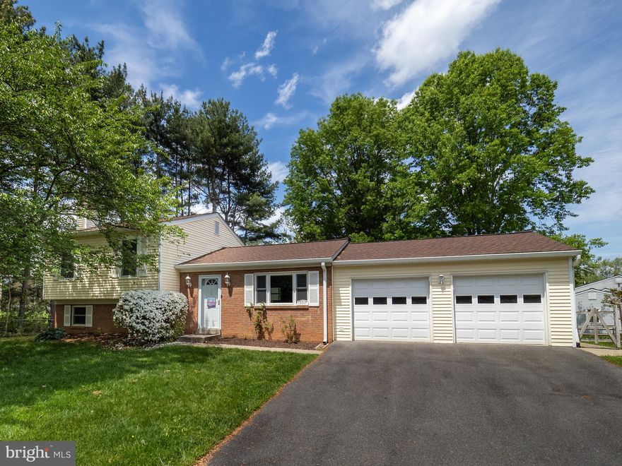 This home has great style and is in move-in condition. The owners renovated the main level creating a modern, open plan. This space features hardwood flooring, recessed lighting and is flooded in natural light. The kitchen has new stainless-steel appliances, beautiful quartz countertops, and painted oak cabinetry. The upper level has four bedrooms and two full baths. The lower level features an expansive family room, a propane fireplace, premium laminate flooring, recessed lighting, a half bath, and utility room with a premium high-efficiency washer and dryer set. An extra bonus room could be your home gym, playroom, office and more! The outside spaces of this home are just as special. An oversized deck is accessed from the living area, and the huge back yard is fenced and has two storage sheds. The roof and HVAC are only a few years old, and all windows have been replaced. With its upgrades, superior condition, and premium lot, this home is an incredible value!