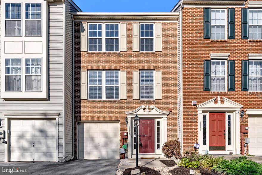 Welcome home to this well-maintained brick-front townhouse offering comfort, convenience, and style in a prime location. Step inside to find fresh new carpet (2025) and a spacious, light-filled interior designed for everyday living and entertaining. The large kitchen features abundant counter space and loads of natural light—perfect for gathering with family and friends.

The fully finished basement provides additional living space, ideal for a family room or home office.  Upstairs, the primary suite offers a peaceful retreat with two walk-in closets, soaking tub, and separate stall shower.

Enjoy outdoor living on the freshly stained deck and a fenced rear yard with a storage shed for added convenience.  Major updates include a 2019 HVAC system with a 10-year warranty and a 2023 water softener.  Located close to major commuting routes, shopping, and dining—this home combines modern updates, a scenic setting, and a fantastic location.