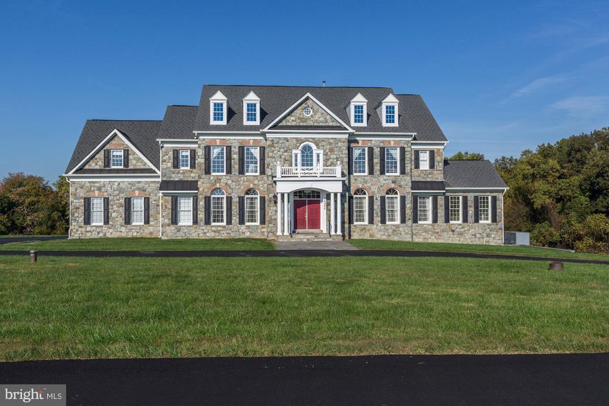 Magnificent stone & brick colonial with over 9,000 finished square feet of living space sited on a terrific 2.5 acre lot. Absolutely every bell and whistle in this house including a home theater, chef's kitchen with Viking and SubZero, cherry closet organizers in every closet, the list goes on. Beautifully sited on 2.5 acre lot with circular drive and 3 car garage. *OPEN HOUSE Jan 29th from 1-3pm*