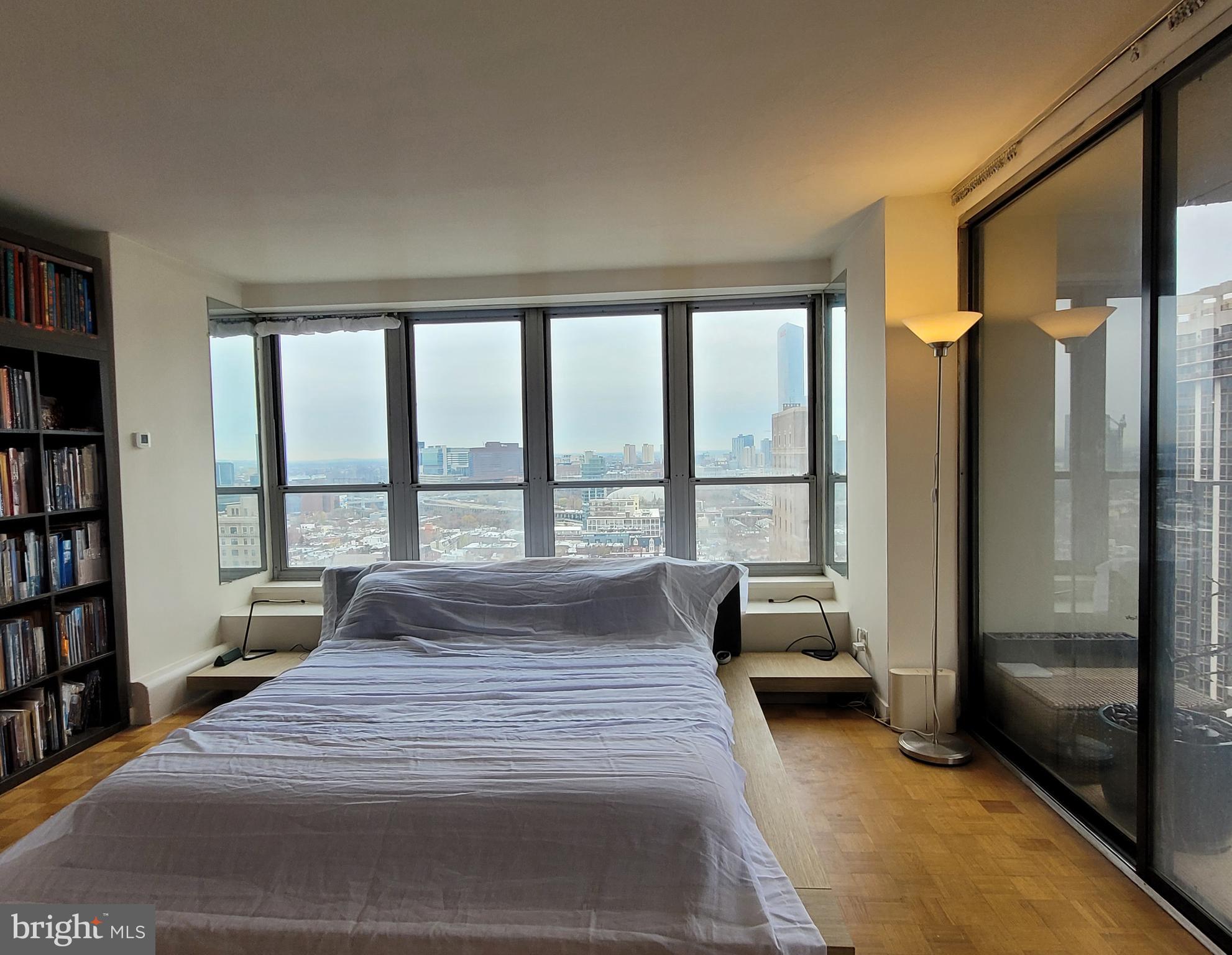 Spacious corner studio with a private balcony on a high floor of The Dorchester, located directly on Rittenhouse Square! This light-filled home features two walls of oversized windows boasting magnificent city skyline views to the north and dramatic sunset views to the west. The open living area enjoys ample space for bedding and entertaining, parquet wood floors, and access to the private balcony with partial views of Rittenhouse Square. Past the living space is a separate dining alcove beaming with natural light from more oversized windows. Adjacent is the galley-style kitchen with wood cabinetry, breakfast bar, and tile floor. There is a dressing area with excellent closet and storage space that leads to the full bathroom with single vanity, tub shower, and tile floor. Residents of The Dorchester enjoy a twenty-four hour doorman and all utilities are included in the condo fee. Use of the building’s state-of-the-art fitness center, seasonal rooftop pool club, and valet parking in the building’s underground garage are available for an additional fee (subject to availability). No pets permitted. Location is everything...Rittenhouse Square was ranked the 6th best neighborhood in North America with 175 restaurants and 199 retailers within a three block radius. Be within close walking distance to the Market Street office corridor, The Avenue of the Arts and University City. 30th Street Station and Philadelphia International Airport are only minutes away.