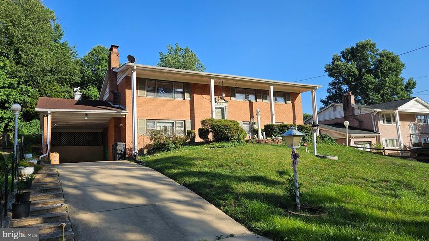 Welcome Home!  While this lovely, well cared for home is outdated, the potential and equity are unlimited here.  4 bedroom, 3 bathroom, ALL BRICK Split-Foyer with a Carport, and with beautiful and practically untouched "BRAND NEW" HARDWOOD FLOORS! -- The main level that is carpeted in green has hardwood floors underneath that have been protected and have NEVER BEEN EXPOSED!!  This property will not last long on the market, so make sure to take a look ASAP to see if this is the perfect house for you and your family to call home.