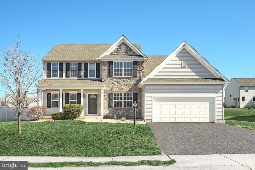 Welcome home  to this beautiful 4-bedroom, 2.5-bathroom colonial home located in Northeastern Schools. Nestled in the Rolling Meadows community, this home offers not only a fantastic living space but also access to top-notch amenities including a community pool, playground, pavilions, and more. Step inside to an open layout featuring 9-foot ceilings and beautiful LVP flooring throughout the main level. The combined kitchen and living room are perfect for entertaining, with a modern kitchen equipped with ample storage, a pantry, stainless steel appliances including a  brand new refrigerator and dishwasher. The formal living room adds a touch of elegance with wainscoting and crown molding, creating an inviting atmosphere for guests. The first floor also features a convenient laundry area located in the oversized mudroom, plus an additional storage closet. The highlight of this level is the primary bedroom suite, complete with a dual vanity, renovated shower and large closet space. Upstairs, you'll find three sizable bedrooms, each with plenty of storage. The bonus loft area offers versatile options, whether you need a second living space, home office, or playroom. Outside, relax and unwind on the large deck, perfect for evening gatherings, or enjoy your morning coffee on the covered porch. With easy access to major amenities, schools, and highways, this home provides the ideal blend of comfort and accessibility. Don't miss out—schedule your showing today and make this wonderful home yours!