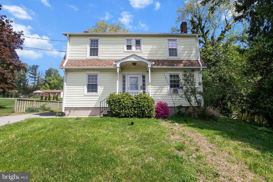 Discover the timeless charm of this lovely Parkville Colonial! From the moment you step through the front door, you are greeted by a stunning staircase and classic character throughout. Relax in the living room, which features a cozy wood-burning fireplace and an attached sunroom perfect for a home office or reading nook. The formal dining room flows seamlessly into a spacious kitchen with plenty of room for a cozy breakfast area. Potential awaits on every level: Basement high-ceilings,  and the walk-out offers a blank canvas for more living space while the expansive attic provides incredible storage or future renovation possibilities. With three sizeable bedrooms and endless opportunities to customize, this is the perfect place to grow from a first home into a forever home.