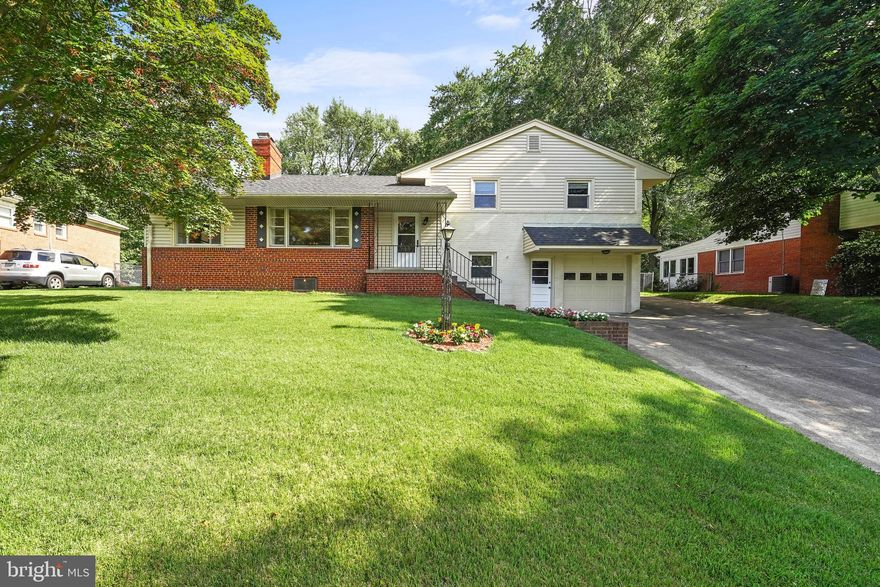 WONDERFULLY MAINTAINED FOUR-LEVEL SPLIT WITH FANTASTIC LEVEL & FENCED YARD WITH YOUR OWN BASKETBALL OR PICKLE BALL COURT!!  FORMAL LIVING AND DINING ROOMS WITH HARDWOOD FLOORS, TWO BRICK HEARTH FIREPLACES (ONE IN LR AND ONE IN FAMILY ROOM), TWO FAMILY ROOMS, EAT-IN KITCHEN WITH TABLE-SPACE AND PLENTY OF COUNTERTOP & CABINET SPACE.  FIRST LOWER LEVEL FEATURES SECOND FAMILY ROOM WITH ADJACENT HALF BATH, LAUNDRY ROOM AND ACCESS TO SINGLE-CAR GARAGE AND SECOND LOWER LEVEL OFFERS LOADS OF STORAGE OR WORK SPACE AND FINISHED BONUS ROOM/OFFICE.  INVITING SCREENED PORCH AND DECK OVERLOOKING THE BEAUTIFUL AND FUNCTIONAL YARD!  SUPER CONVENIENT LOCATION JUST 1.2 MILES TO FDA, MINUTES TO RT. 200 (ICC) AND EASY WALK TO HIKING TRAILS AND MLK PARK WITH INDOOR/OUTDOOR POOLS, TENNIS, BASKETBALL AND BALL FIELDS!