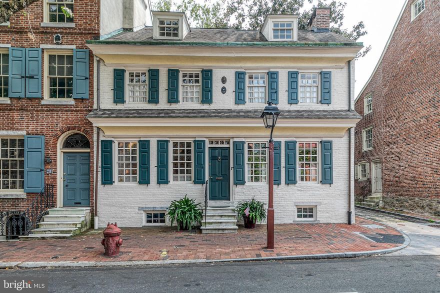 Welcome to 220-222 Spruce Street! This is an incredible opportunity to own a piece of history in coveted Society Hill. This light-filled corner home has three exposures and has been meticulously maintained, retaining its charm and historical character. It is a unique double-wide home that was built in 1743. You will find the original random width restored hardwood flooring from 1743 throughout (except for kitchen and den), original moldings, 3 bedrooms, 2 home offices, a garden family room, 2.5 baths, original fireplaces, modern kitchen with stainless steel appliances, light-filled vaulted ceilings with all of the historic charm of Colonial Philadelphia. The main floor boasts a one-floor living set up that includes a formal living & dining room, kitchen, bathroom, and a fantastic garden family room which leads to a stunning yard, ideal for entertaining guests or relaxing under the beautiful magnolia tree. You will be impressed with the unique scale and design of the third floor, which includes two rooms that are perfect for a 3rd bedroom and an office, study, or play area. This beautiful, one-of-a-kind home sits in a prime location, just steps away from the waterfront and Harbor Park, Philadelphia's most historic sites and museums, the Philadelphia business & shopping districts, a variety of restaurants, and the city's public transportation. Also included with this treasure is 1 year of pre-paid parking at the garage at  2nd and Lombard Street, credited to the buyer at settlement.