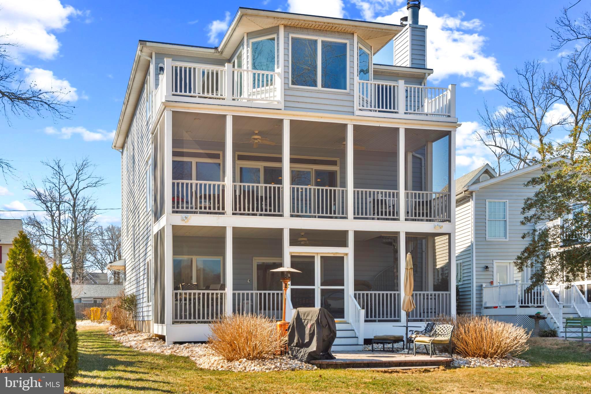 Wonderful waterfront home located on deep Oyster Creek with direct access to the Chesapeake Bay! Sprawling three levels of waterfront views fronted by large screened in porches, the home provides great areas for entertaining with a blend of coastal living. Custom-built in 2004 by a former midshipman, this energy efficient property is equipped with two separate Geo Thermal HVAC systems that keep the home comfortable year-round with fractional energy costs compared to comparable and even smaller homes on standard systems. Inside, the home boasts hardwood flooring, 9-foot ceilings, and large Anderson windows with views overlooking the water and private pier, which is equipped with water and electricity. Natural light beams into the living areas of the home, which feature wood burning-fireplaces located on two of the three levels. Crown and wall moldings throughout emphasize the custom craftsmanship that was put into the home when built. A modern kitchen with a cooktop and double wall oven are paired with granite countertops. The kitchen leads to the main eating and living area overlooking Oyster Creek with the Chesapeake Bay in the distance. A large master bedroom with a tray ceiling sits atop the third level with two individual decks perfect for enjoying a morning beverage. Two separate walk-in closets in the master provide ample space for all wardrobe needs. Master bath includes a jetted tub, walk in shower and double vanity. Main entrance level is highlighted by a beautiful cherry wood bar complete with accompaniments including a wine fridge, mini fridge, kegerator and highlighted by built in shelving. This area sets the tone for entertaining as guests can walk out onto the two-level screened in porch connected by a spiral staircase. The exterior lawn area is complete with hardscapes, lighting and irrigation systems. The rear patio and large yard along Oyster Creek provides plenty of space for outdoor gatherings, badminton, and volleyball. The waters edge is solidified by rip rap leading to the private pier, with a mean low water depth of 4 feet, ready for your boat. Of note, this home is also NOT in a flood plain, and does NOT require flood insurance.
This incredible home is located just minutes away from downtown Annapolis and Eastport. The Community provides a gated private beach on the Chesapeake Bay complete with a new playground within walking distance, along with community piers for boating and fishing.
Interior pictures COMING SOON!