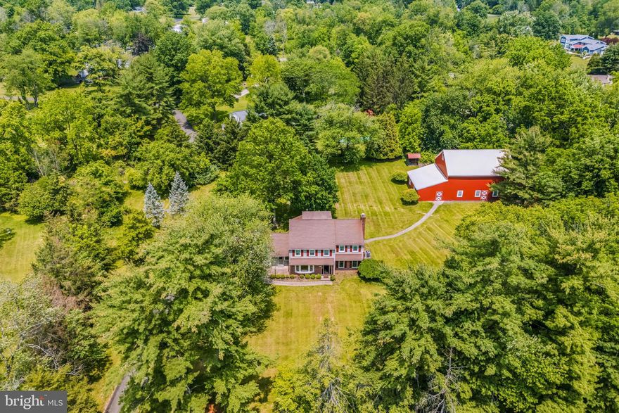 Possibilities Await! Welcome to 1305  E Meetinghouse Road!  Nearly 2-acres of property in Wissahickon School District! Fantastic opportunity -  Call for details!