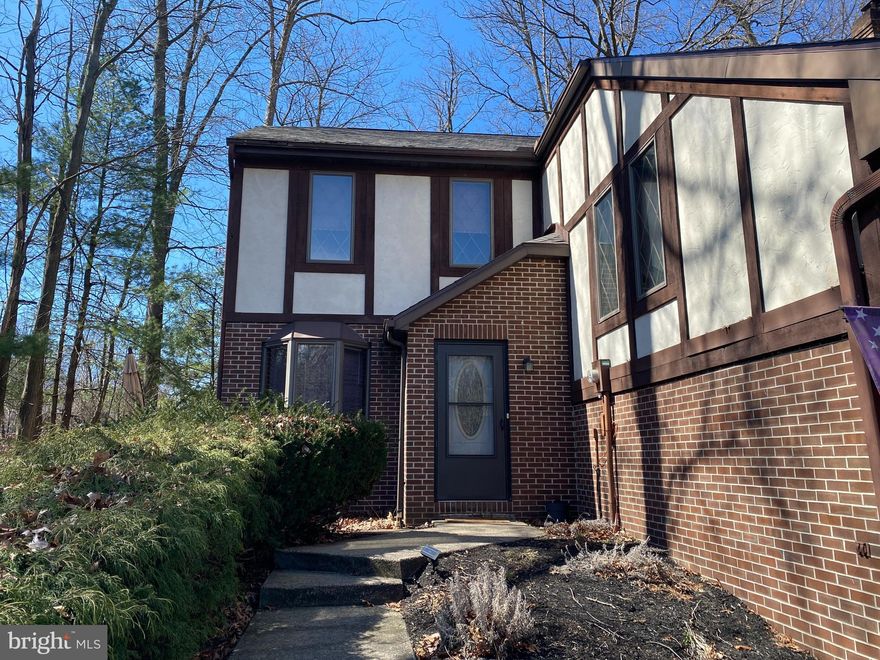 Enjoy the benefits of home ownership with no HOA fees! This spacious townhome is tucked away at the end of a peaceful cul de sac. Features include an open-concept living area, a kitchen with an island & stainless appliances, all adjoining a new sunroom to capture views of the woods behind.  The second floor boasts a private owner suite complete with an updated, high-end bath and a large walk-in closet. This bedroom is big enough for a California king-size bed! On the third level, we have two more spacious bedrooms with walk-in closets and a newly remodeled bath. Each bedroom offers plenty of natural light with lots of windows.  The deck and sunroom provide the perfect place to relax and enjoy the view of the private wooded yard. Lots of recent improvements, including updated bathrooms, a newer roof (2022), a new hot water heater (2024), a newer furnace (2021), new carpeting in the hallway, and 2 bedrooms (2025). This well-maintained home is move-in ready!