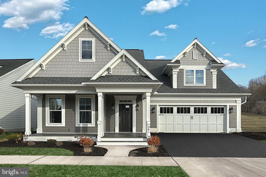 This charming 1-story home in the 55+ community of Home Towne Square with a welcoming front porch includes 9’ ceilings, a 2-car garage with mudroom entry, and a screened-in deck. Stylish vinyl plank flooring in the foyer extends to the main living areas. The kitchen, featuring quartz countertops with tile backsplash, stainless-steel appliances and large center island, opens to a sunny dining area with sliding glass door access to the screen-in deck. The spacious living room boasts a beamed cathedral ceiling and a gas fireplace with floor to ceiling stone surround and box beam mantel. A carpeted flex space to the front of the home can be used as a home office, den, or other use to fit your needs. Tucked to the back of the home is a large owner’s suite with a tray ceiling, an expansive closet, and a private bathroom with a 5’ tile shower and double bowl vanity; the laundry room is conveniently just around the corner, and across the hall from the suite is a guest bedroom and full bathroom.