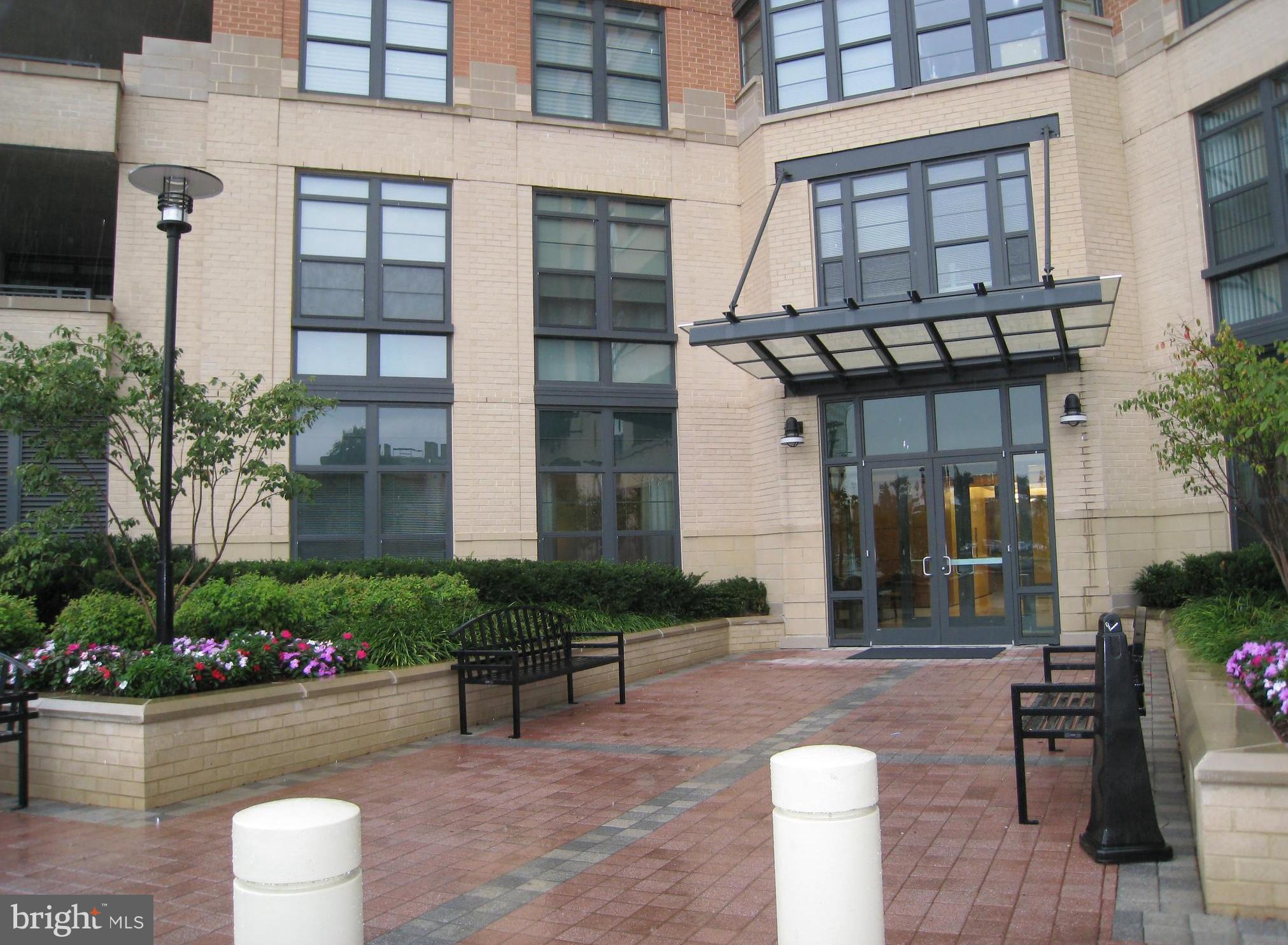 ** This Designer Showcase has Custom Upgrades throughout the Entire Unit *** Exclusive "Paramount" At Reston Town Center ** 2BR & 2.5BA + Den/Family Room ** 3 Reserved Parking Spaces (G2-69, G2-70 & G2-71) *** Storage Room(G2607) *** Truly Top Of Line Gourmet Kitchen *** Grand Living Room W/Marble Surround Gas Fireplace(Deco Use Only) *** Bright Corner Unit (Almost 1,800 Sq. feet) *** Floor to Ceiling Windows *** Balcony *** The Location of this Condominium in Reston is Second to None as It is easy to get in and out of Reston Town Center Area *** Walk to Shops, Book Stores, Restaurants, Ice Skating Ring, Entertainment and Super Market. *** Come & Enjoy Urban Living At It's Finest *** Front Desk Hours , Open 8 am-10 Pm on Mon-Fri, Open 8am-6pm on Sat & Sun *** Available August 5 *** No Pet & No Smoking *** Sauna is As Is & Gas Fireplace is for Decollation purpose only ***