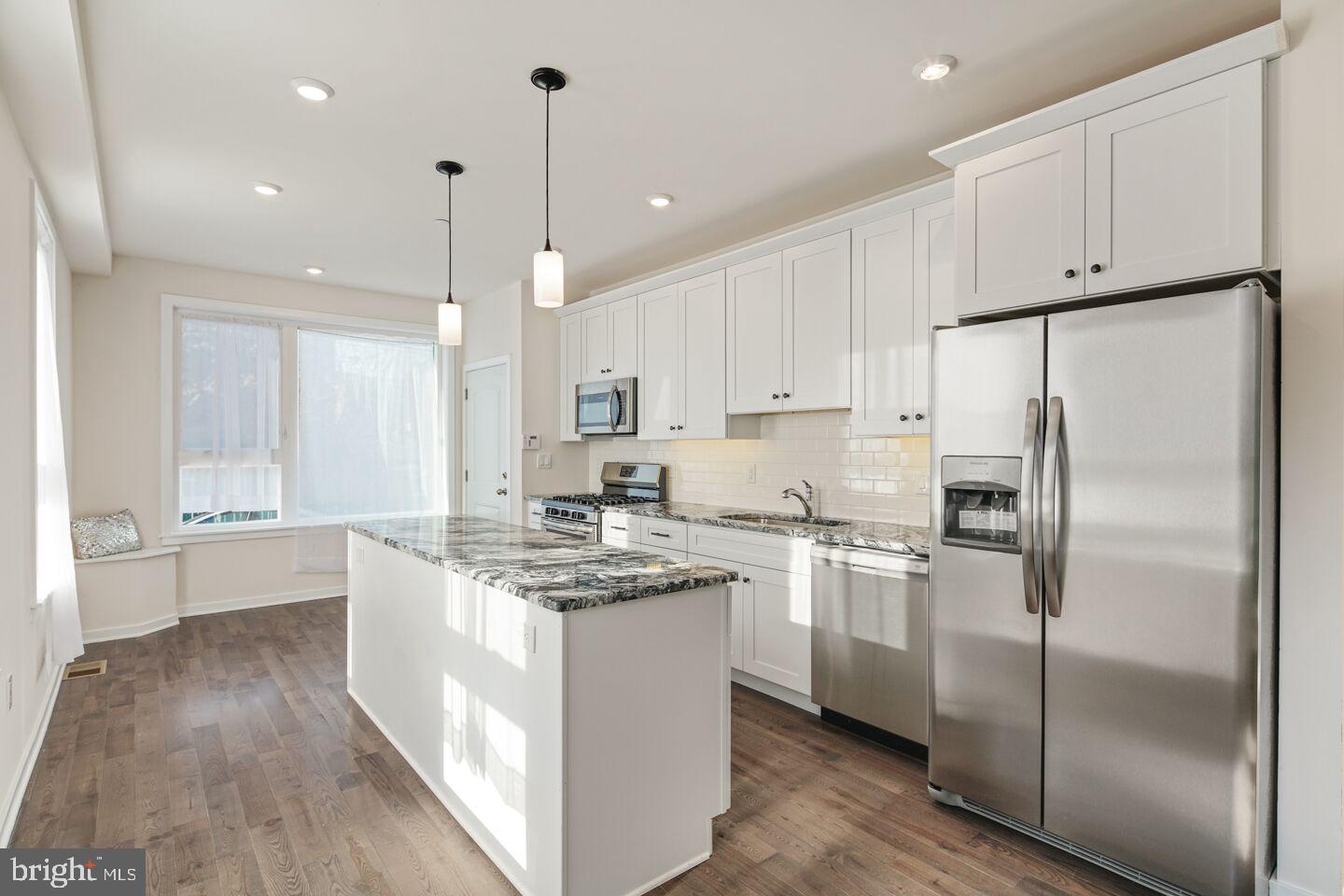 New Construction Condos! This corner building has unobstructed views of Philadelphia's skyline and impeccable design. This building sets itself apart from the competition! This luxury units consist of two bedrooms, two bathrooms, and private outdoor space. It also includes an open floor plans, 4-inch oak hardwood floors, and recessed lighting. The kitchen features Tribeca Shaker cabinets and has granite countertops, Frigidaire stainless steel appliances, and a center island. The master bedroom has its own private bathroom and ample closet space! Additional features include an approved 10-year tax abatement, separately-metered utilities (water, electric, and gas), an outdoor, fenced-in storage area, and an intercom with video monitor. Located near the Metropolitan Opera House, the Divine Lorraine Hotel, and Temple University and within walking distance to Septas Broad St. and Girard Avenue subway station!