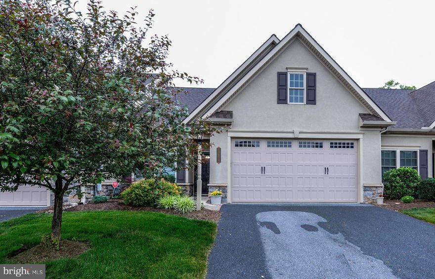 This home offers a lot of charm and character, very sophisticated taste! Open concept with large great room, 9' ceilings, tray ceiling. lovely kitchen with large island, black stainless steel appliances, professionally faux painted backsplash, 1st floor master bedroom and bathroom, tray ceiling, and bath with walk-in shower. 2nd bedroom and large loft on 2nd floor. Home has a reverse osmosis system for drinking water at faucet and thru fridge. Flooring throughout laminate and Coretek (a high quality laminate).