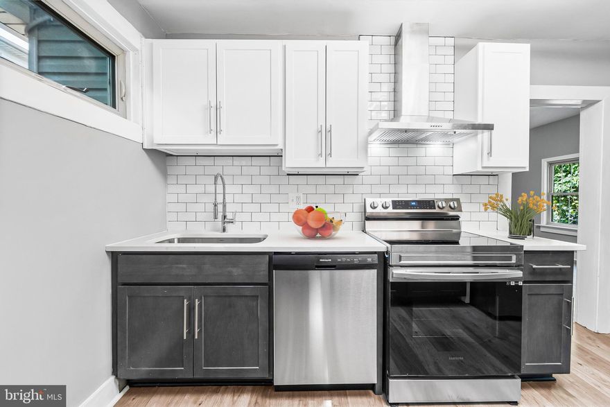 Priced To Sell Fast! Charming Updated Bungalow, Spacious Kitchen with QUARTZ Counters, New Cabinets, Stainless Steel Appliances, Modern Tile Backsplash, Spacious Bedrooms, New Custom Paint, Updated Bathroom, New Flooring, New Lighting, Fenced Backyard, Much More!! Close to Schools, Shopping, and Commuter Routes. This Will Not Last!