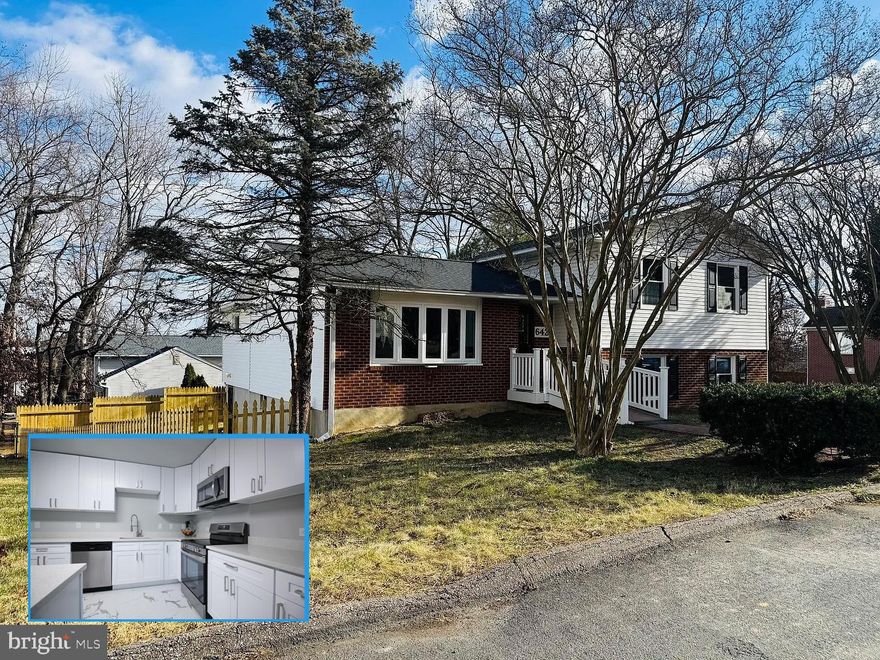 Much larger than it appears! This expansive home offers incredible square footage, multiple living areas, and a highly sought-after layout with two primary suites—perfect for multi-generational living, guests, or rental potential. Located on a quiet dead-end street, the property features a fully fenced backyard with brand-new sod, a new fence, and a low-maintenance Trex deck, ideal for outdoor enjoyment. Brand-new paved parking and a new architectural shingle roof add peace of mind, with many windows already replaced.

The main level primary suite offers a private entrance, its own mini-split for independent heating and cooling, and washer/dryer hookups, making it an ideal in-law or guest suite. The main level also features a living room and dining room with professionally refinished hardwood floors.

Upstairs, you’ll find a second primary suite, plus two additional bedrooms and a hall bathroom, offering space and privacy for everyone. In total, the home includes three bathrooms—two brand new and one beautifully updated.

The lower level boasts two large family rooms, one with an electric fireplace, along with an office, utility room, and a huge bonus storage room with walk-out access. This space can easily be finished into an additional bedroom or second in-law suite, offering endless possibilities.

Inside upgrades include a brand-new kitchen with high-end soft-close shaker cabinets, quartz countertops, and stainless steel appliances; new flooring throughout, fresh paint, and modern finishes. Major systems have been updated with a brand-new heat pump and central AC, 200-amp electric service, a high-efficiency hot water heater, and new insulation in the attic and basement areas. All work completed with permits.

Bonus propane whole house generator!

With its generous size, flexible layout, and extensive updates, this home offers exceptional value and endless potential. Don’t miss this one—it truly must be seen to appreciate how large it is.