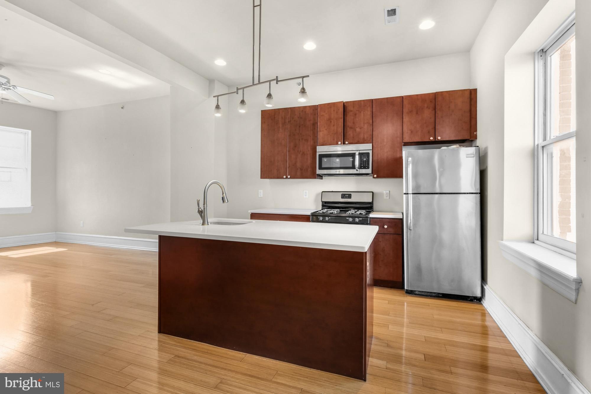Available Now | Leasing Special: $1,000 lease credit for any new lease signed by 10/1/25! This credit will be applied to the rental account after move-in and can be used in any way the tenant chooses. Tenant to pay gross rent monthly. The gross rent is $1,650/month, and the net effective rent is $1,567/month.
Welcome to 2136 E Dauphin St #301! This is a 1 bedroom, 1 bathroom third floor apartment featuring 1 off-street parking and an open floor plan with modern finishes and abundant sunlight. Enter into the main living area with hardwood floors and recessed lighting that follow you through the unit. There's a ceiling fan for added comfort and great natural light for a spacious and bright atmosphere. The open common area leads back to your modern kitchen boasting dark cabinetry, an island with counter seating and extra prep space, and sleek stainless steel appliances including dishwasher, built-in microwave, refrigerator, and oven-stove. Head into your sizable bedroom offering a charming round window, a ceiling fan, and good closet space. You can access your bathroom from both the bedroom and the living area for added convenience. Bathroom features include a lighted vanity with storage and a beautiful, fully tiled shower stall. There's a closet by the entrance with your stacked washer and dryer and central a/c will ensure your comfort all year. 1 off-street parking spot is available behind the building for an additional $100/month and additional storage is included. Located in East Kensington, this unit is perfect for those seeking comfort and style. Don't miss out on this fantastic opportunity!
Lease Terms:
Generally, 1st month, 12th month, and 1 month security deposit due at, or prior to, lease signing. Other terms may be required by Landlord. $55 application fee per applicant. Pets are conditional on owner's approval and may require an additional fee and monthly pet rent, if accepted. (Generally, $500 deposit and $25 monthly fee per pet). 1 off-street parking spot is available for an additional $100/month. Tenants responsible for: electricity, gas, cable/internet, and a $50/month flat water fee. Landlord Requirements: Applicants to make 3x the monthly rent in verifiable net income, credit history to be considered (i.e. no active collections), no evictions within the past 4 years, and must have a verifiable rental history with on-time rental payments. Exceptions to this criteria may exist under the law and will be considered. Cosigners accepted.