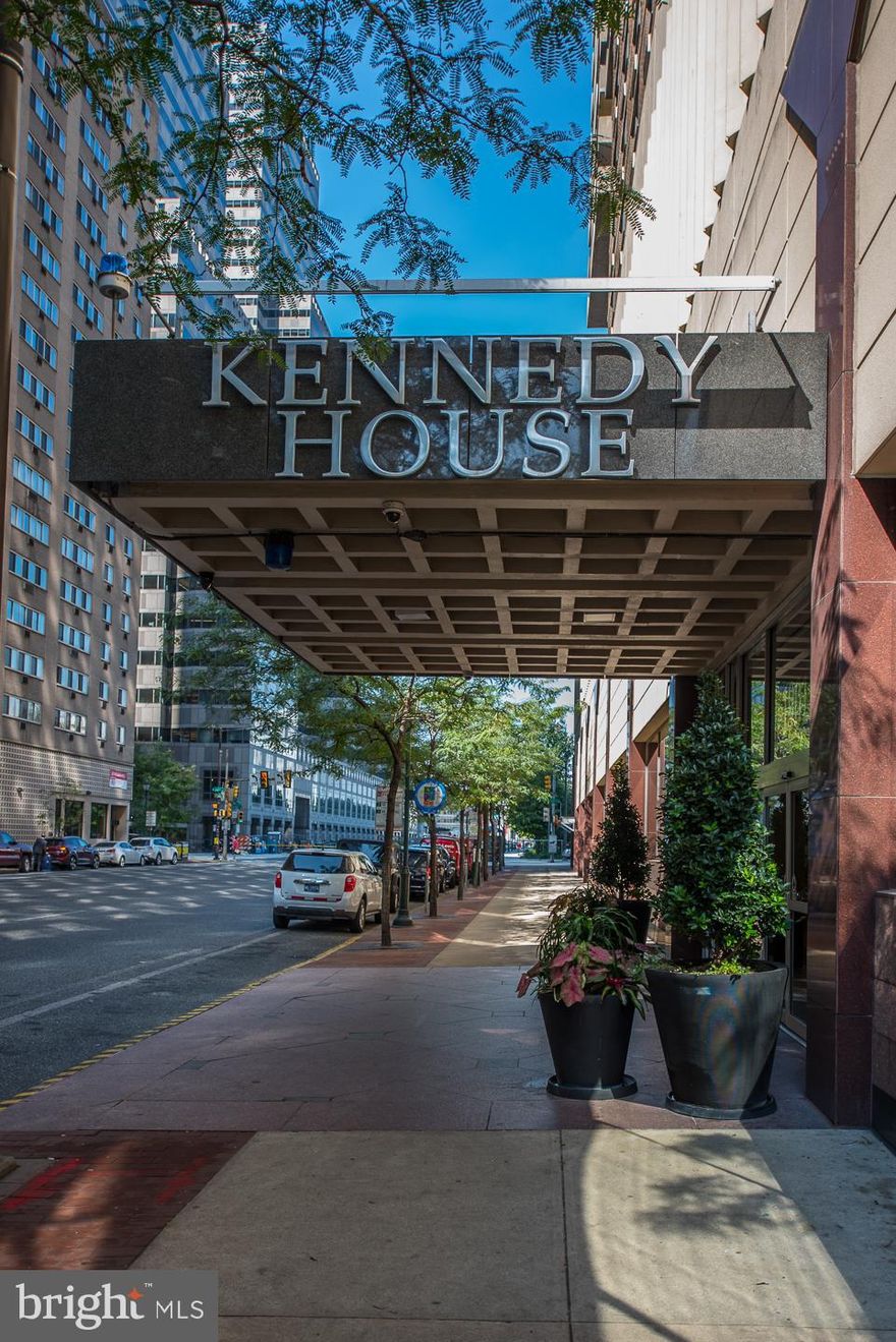 Bright and sunny 849 Sq Ft, 1 bedroom, 1 bathroom southern facing unit at the Kennedy House awaits!  This spacious unit features an open living and dining room with city views.  The galley kitchen with white cabinetry offers ample storage and workspace, serving window and, convenient in-unit laundry.  A large bedroom with walk-in closet, a full hall bathroom with bathtub and extra storage space completes this unit.  The Kennedy House has 24-hour Security & Doorman, On-Site Management & Maintenance, Full Laundry Facility on the 30th Floor, Amazing Rooftop Swimming Pool & Patio (Undergoing an Extensive Upgrade to be finished this Spring) with breathtaking views , Complete Fitness Center for only $120 annually, On-Premises PARKING GARAGE available at 50% off standard rates, and Hospitality Suites. THE MONTHLY FEE INCLUDES ALMOST EVERYTHING: All Utilities including electric, heat, air conditioning, water & basic cable, All Real Estate Taxes & Maintenance Package. This unit features an abundance of closet space, a storage locker available at no additional charge, and newer, top-of-the-line windows. Nominal real estate transfer tax & no title ins. Required. The Kennedy House is one block from Suburban Station, three blocks from Amtrak 30th Station, and within two blocks of the SEPTA 13 Bus. The Kennedy Market Restaurant and Chima Brazilian Steakhouse are located in the building. Experience the ability to walk out your door to first-class, 4-star restaurants, fabulous shopping & all the conveniences of this sought-after neighborhood—one-time admin fee paid at closing.