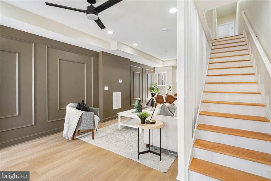 Welcome home to this beautifully renovated Baltimore City rowhouse featuring 3 bedrooms and 3 full baths. Every detail has been thoughtfully designed — from the warm, inviting color palette to the stylish accent walls in the living room and primary suite. The fully updated kitchen shines with brand-new stainless steel appliances, modern cabinetry, and sleek finishes. With three full bathrooms, spacious bedrooms, and a layout that blends comfort and style, this home offers the perfect mix of character and convenience. Just move in and enjoy modern city living at its best!