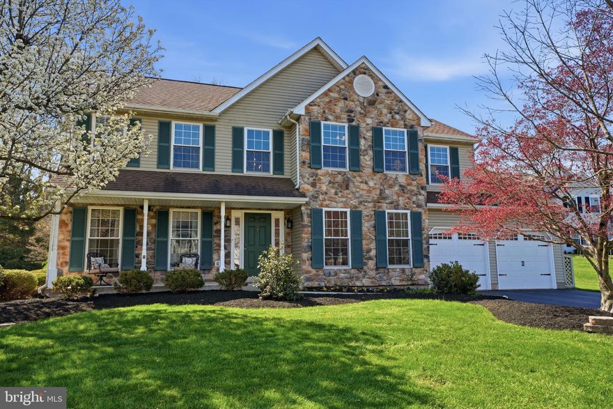 Nestled near the end of a quiet cul-de-sac in desirable Yardley and located within the prestigious Pennsbury School District, this absolutely beautiful stone-front center hall Colonial offers timeless elegance, exceptional living space, and a picture-perfect setting. Professionally landscaped with extensive hardscaping and surrounded by a pristinely manicured yard, this impressive home delivers outstanding curb appeal from the moment you arrive. Step inside to discover a gracious living room enhanced by elegant crown molding and plush wall-to-wall carpeting, while the bright formal dining room also showcases crown molding and doors leading to the rear patio — creating the perfect flow for entertaining family and friends. An updated powder room and convenient main-floor laundry room add everyday practicality. The heart of the home is the stunning updated island kitchen featuring granite countertops, ceramic tile backsplash, modern appliances, and a spacious breakfast area ideal for casual dining. The adjoining family room is truly spectacular, boasting soaring vaulted ceilings, skylight that flood the space with natural light, a striking brick fireplace with gas logs, and a custom mantel that creates a warm and inviting atmosphere. Upstairs, the luxurious primary suite serves as a private retreat complete with a sitting area, double wall closets, a walk-in closet, and an amazing remodeled spa-like bath showcasing exquisite tile work, double-sink vanity, soaking tub, and separate shower. Three additional generously sized bedrooms and a well-appointed hall bath complete the second floor. The finished basement is an entertainer’s dream — offering a true entertainment wonderland with a media/movie room, pool table area, and expansive recreation space perfect for relaxing or hosting gatherings. A large storage area and dedicated workshop space provide even more versatility. This exceptional home combines elegance, comfort, and incredible entertaining space, all situated on a serene cul-de-sac street in one of Bucks County’s most sought-after locations.