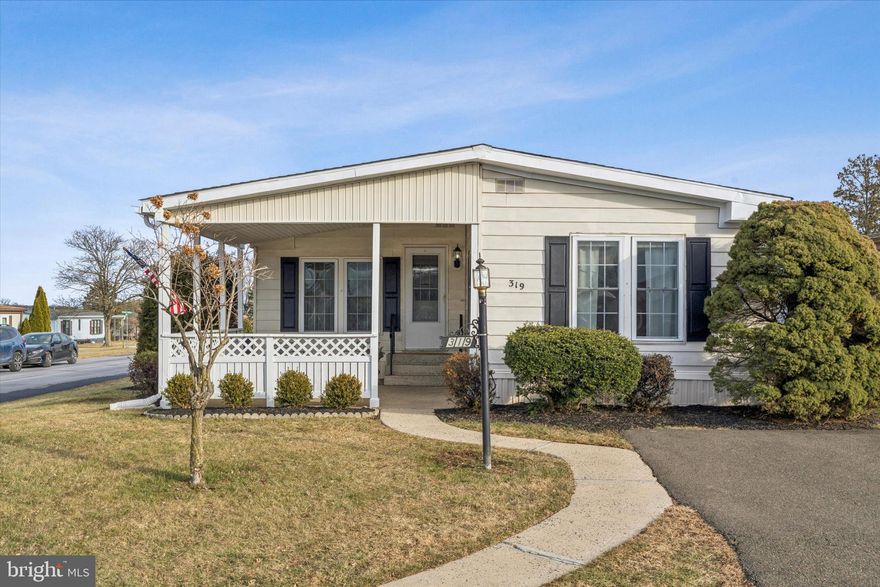 Exciting opportunity to move into a wonderfully updated, like new home in the always popular Village of Neshaminy Falls!  This home offers over 1,100SF of one floor living with an open and airy floorplan and tasteful, modern decor.   A spacious living room with vaulted ceiling, fireplace and handsome built-ins greet you as you enter from the covered front patio.   A bright and cheery kitchen features white cabinetry, stainless sink, all new stainless appliances within the last two years including a brand new refrigerator, one large and one small pantry.  The dining room overlooks a rear deck.  The primary bedroom has a very large closet and a beautiful ensuite bath offering an oversized walk-in shower and gray vanity with quartz counter.  The second bedroom has a double closet and is located close to the hall bath.  There is a full sized laundry area with a brand new washer.  Beautiful newer Pergo floors throughout. The HVAC was new in 2020 and the hot water was replaced in 2024.  Additional assets include replacement windows,  insulation enhancements and newer subflooring,  desirable corner location, rear storage shed, exterior wood trim freshly painted and two parking spots.  Enjoy all the amenities this active adult 55+ lifestyle offers including a brand new Clubhouse with meeting rooms, clubs, year round activities and a community pool.   This is the perfect place to call home if you're looking for affordable, low maintenance living in a very popular community!   Welcome Home!