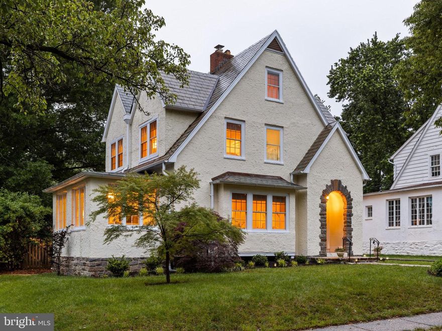 After a long day, you get to pull up to 4404 Eastway. Here’s what’s waiting for you: a stately Tudor tucked along one of Guilford’s most beautiful blocks, the canopy of mature trees overhead, and the timeless charm of Baltimore’s historic architecture welcoming you home.

The interior has been freshly painted, showcasing original hardwood floors, classic details, and a layout designed for comfort and entertaining. The gracious living room with a wood-burning fireplace flows into a sunny dining room perfect for your next dinner party. At the same time, the stylish kitchen features upgraded finishes and room to gather. Just off the kitchen, a cozy den and screened porch open to your private backyard—perfect for morning coffee, weekend lounging, or garden-to-table evenings.

Upstairs, the expansive primary suite includes a sitting room and private bath, while the third-floor suite offers flexible space for guests, work, or play. A convenient second-floor laundry hookup is located in the hallway closet. The stone basement holds even more potential - it is already plumbed for a toilet and sink and features a cedar closet and ample storage.

Major updates include selective exterior stucco repair and fresh paint, newly repointed and painted soffits and fascia, and extensive landscaping and hardscaping in both the front and rear yards. These offer beauty and function in every season. A detached garage and off-street parking make daily living effortless.

This is more than a house — it’s a storybook home in the heart of Guilford. Historic charm, modern upgrades, and that unmistakable “I’m home” feeling — all in one place: 4404 Eastway. Your Home.