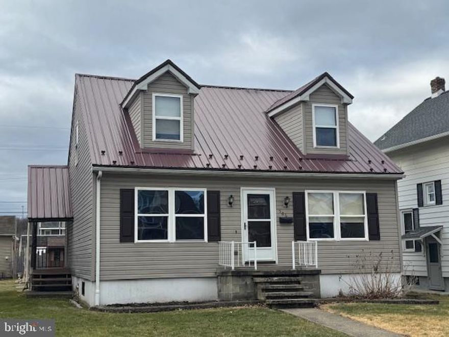 Modular Cape Cod with 4 bedrooms and 2 full baths.  Plus a full basement that is 70% finished with a large rec room and a new pellet stove is being installed.  Basement walls are  insulated Superior Walls, pre-cast concrete. 1 of the first floor bedrooms has laundry hook-ups, so one floor living is possible. Additional laundry hookups in basement if you want top use the room as a bedroom or  office.  Furnace and hot water heater are natural gas.  Electric baseboard heat on second floor. Furnace and Central AC (first floor only) is only 2 years old. Large covered rear deck with paved parking off rear alley. Nice utility shed for all your outdoor "stuff". Newer metal roof makes this a low maintenance property. LOMA letter means no flood insurance required.