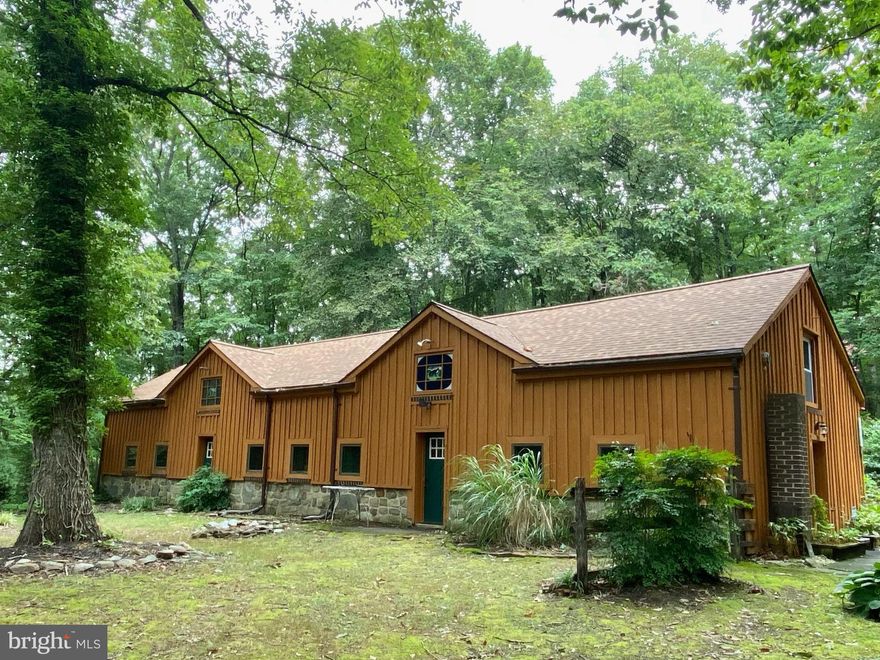 This charming 3 bedroom 2 bathroom home sits on 4+ acres  surrounded by trees! Recently renovated: new windows, doors, flooring, appliances, roof and hot water heater. There is a camp site on the property with water and electric. Enjoy country living while being close to town!