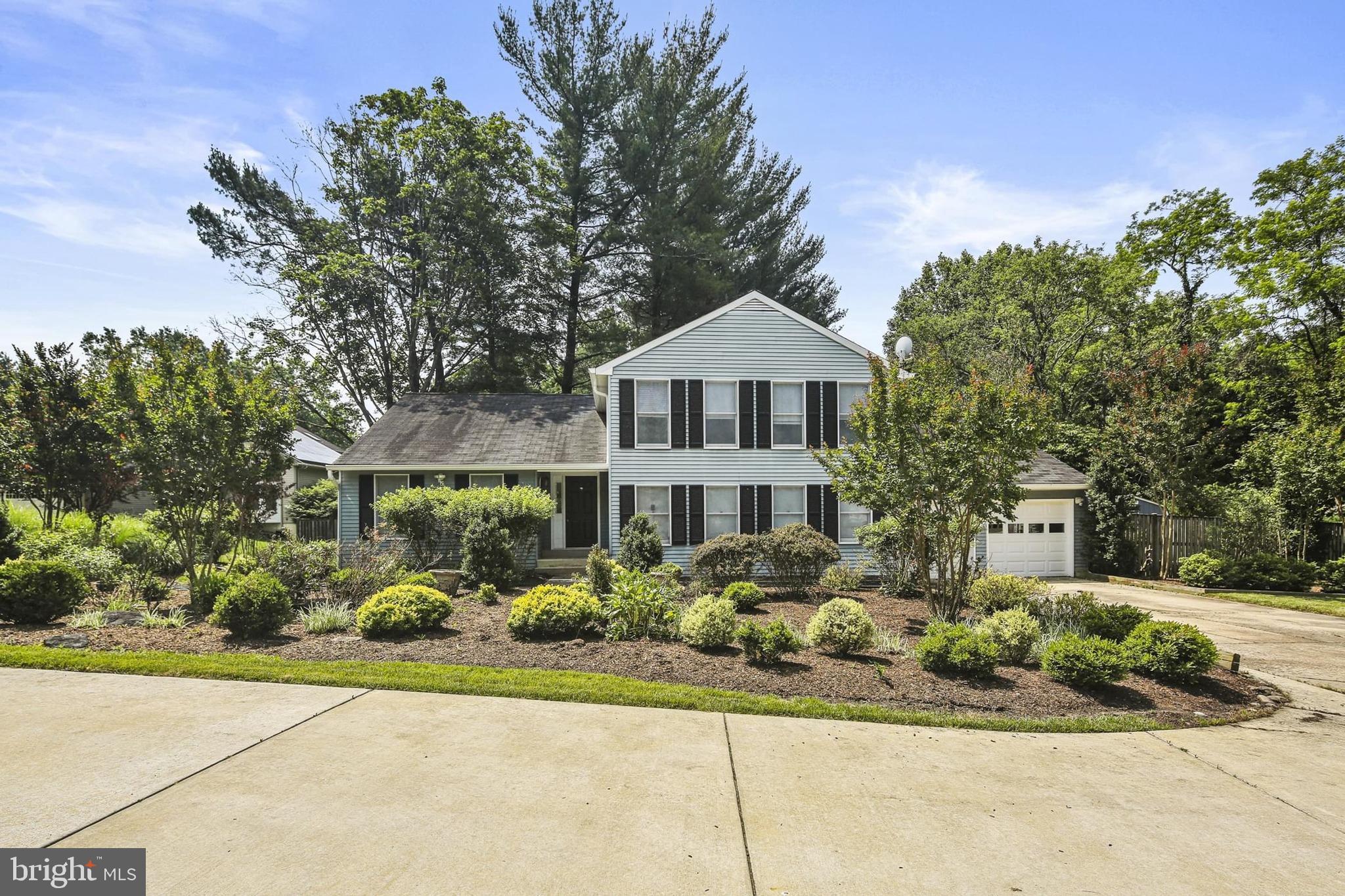 Gardeners Dream! Get lost (or found) in the extensive landscaping, gazebo, decorative bridge, rock features, and multiple decorative ponds of the enclosed yard. This beautiful Dorsey Hall home is available for the first time since its construction and features several large living areas and a custom kitchen on the first level, as well as 1 of 2 laundry rooms. The upper area features 4 bedrooms, common bathroom, and a spacious primary bedroom with attached bathroom. The lower level has the 2nd laundry hook up, a massive open living space, full bath, and a walk-in closet that would make a fantastic root cellar. The seclusion of the back yard will almost make you forget the convenience and community of nearby Dorsey Hall Pool, Columbia Mall, Centennial Park, & historic Ellicott City among other local gems.